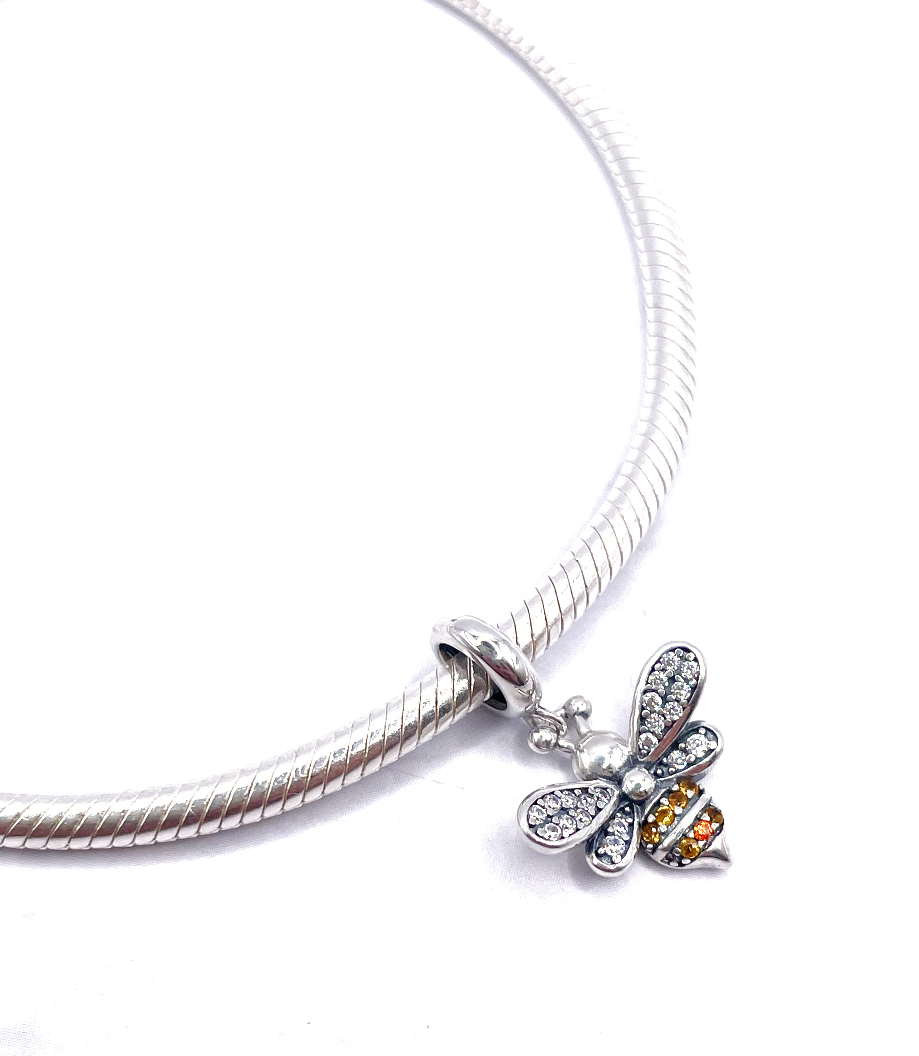 Charm Abeja con circonias blancas en alitas