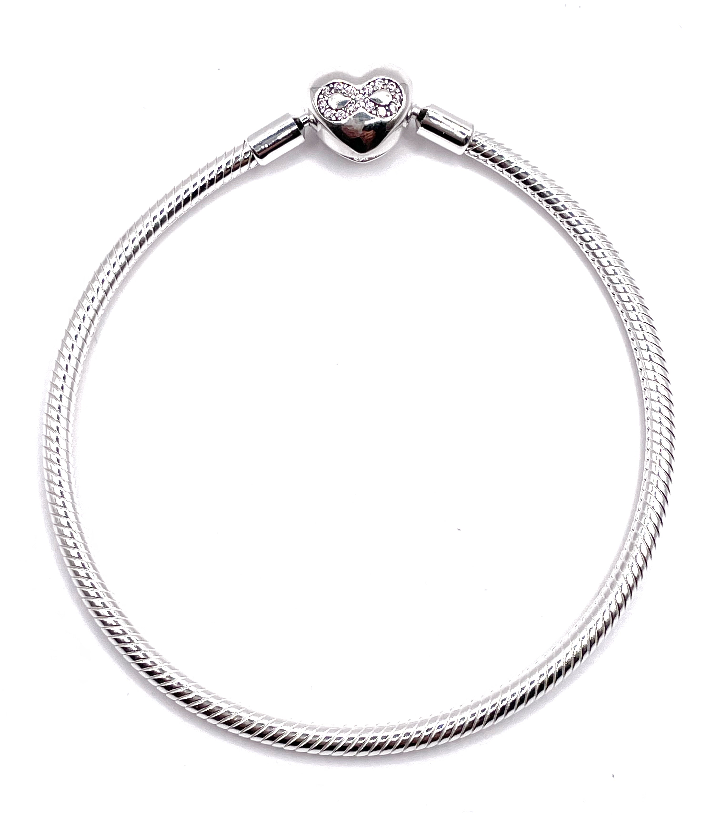 Pulsera flexible broche corazón infinito rosa