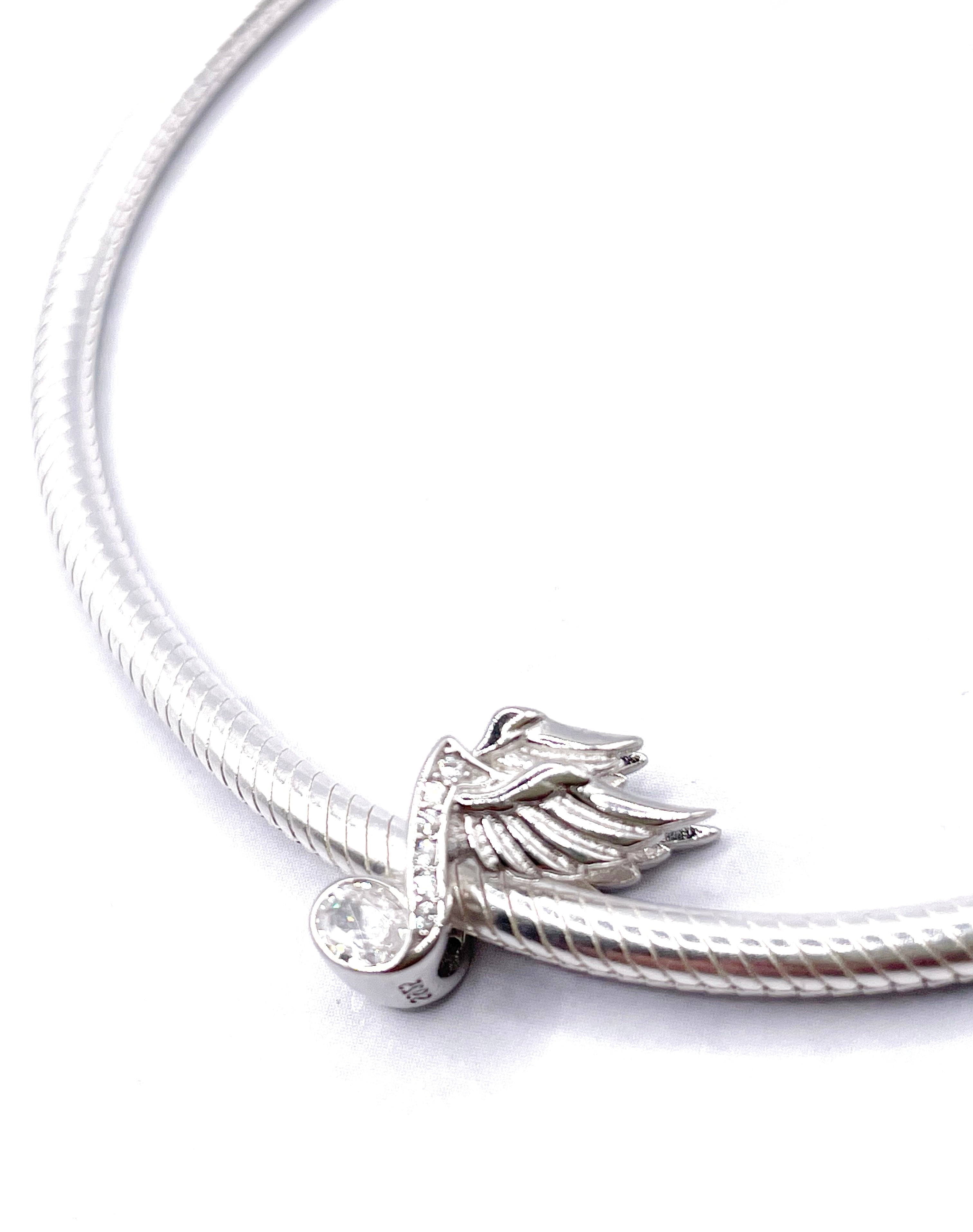 Charm Nota musical con alas