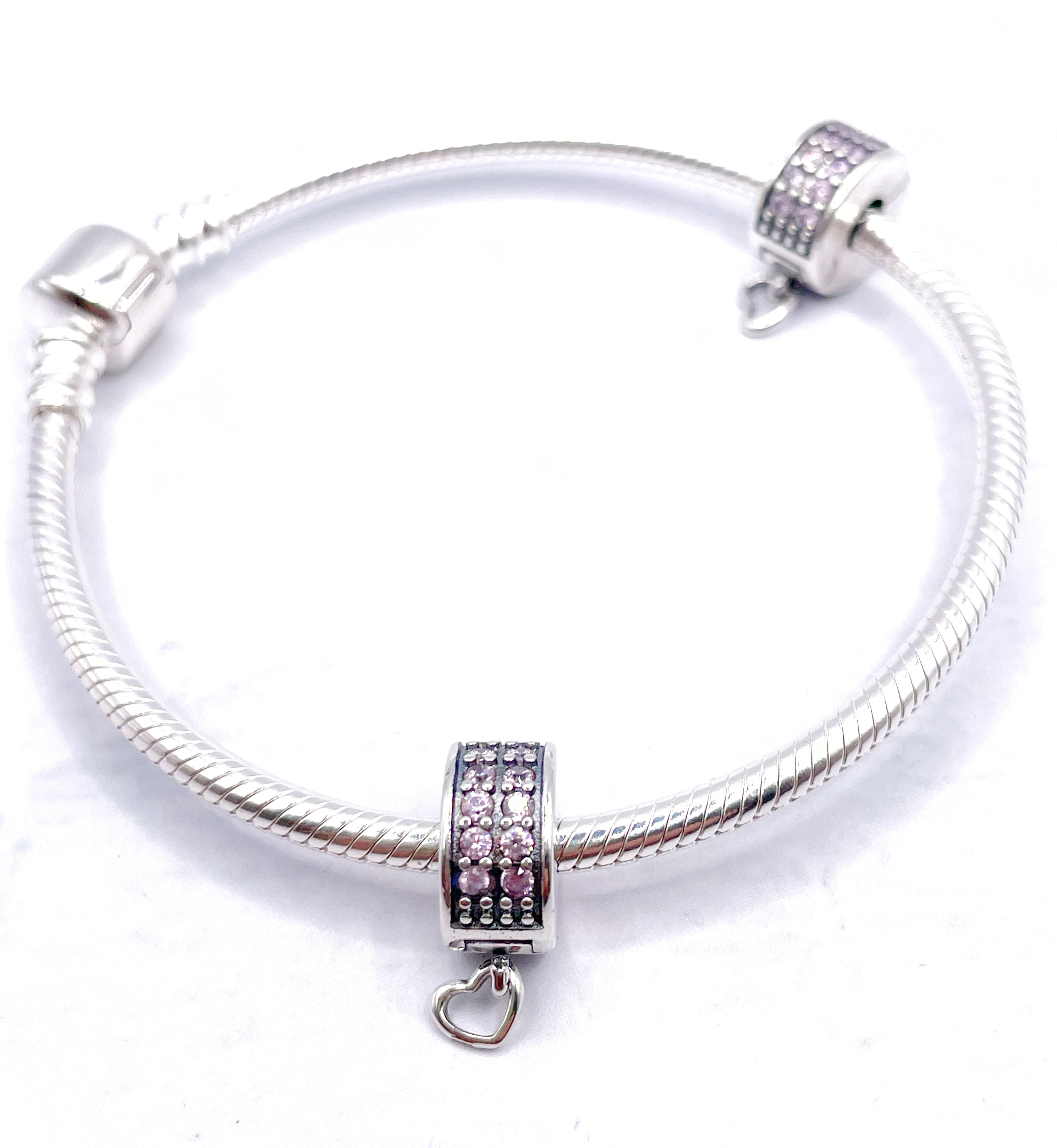 Charms Par de Fijadores clip con circonias rosadas y corazón colgante