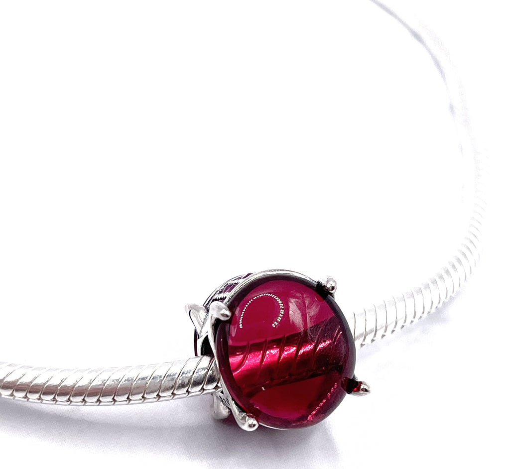 Charm Cabujón ovalado rosa fucsia