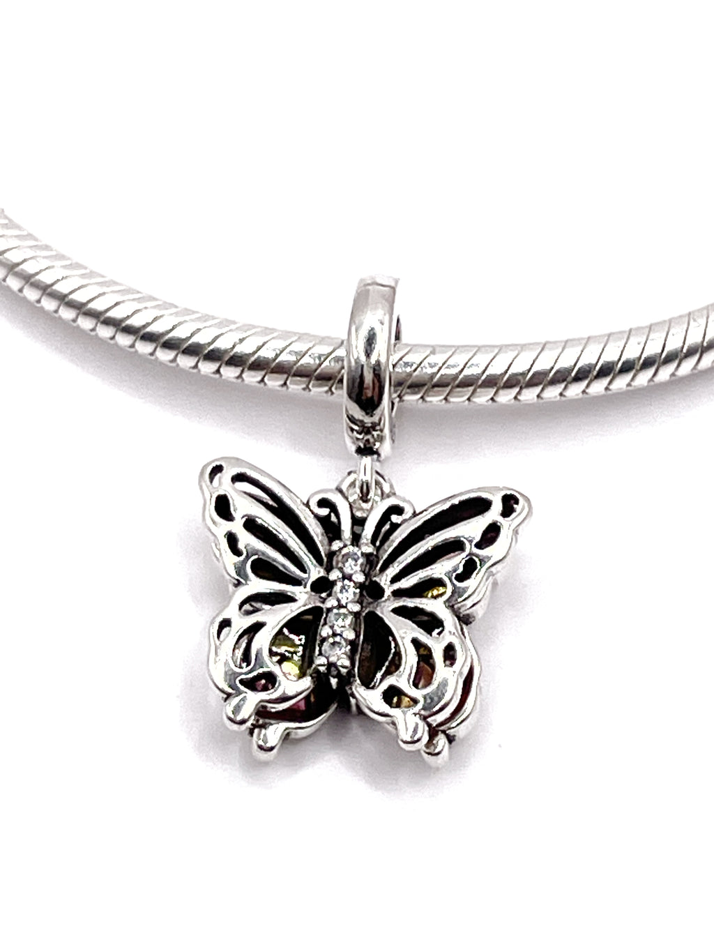 Charm Mariposa doble calada