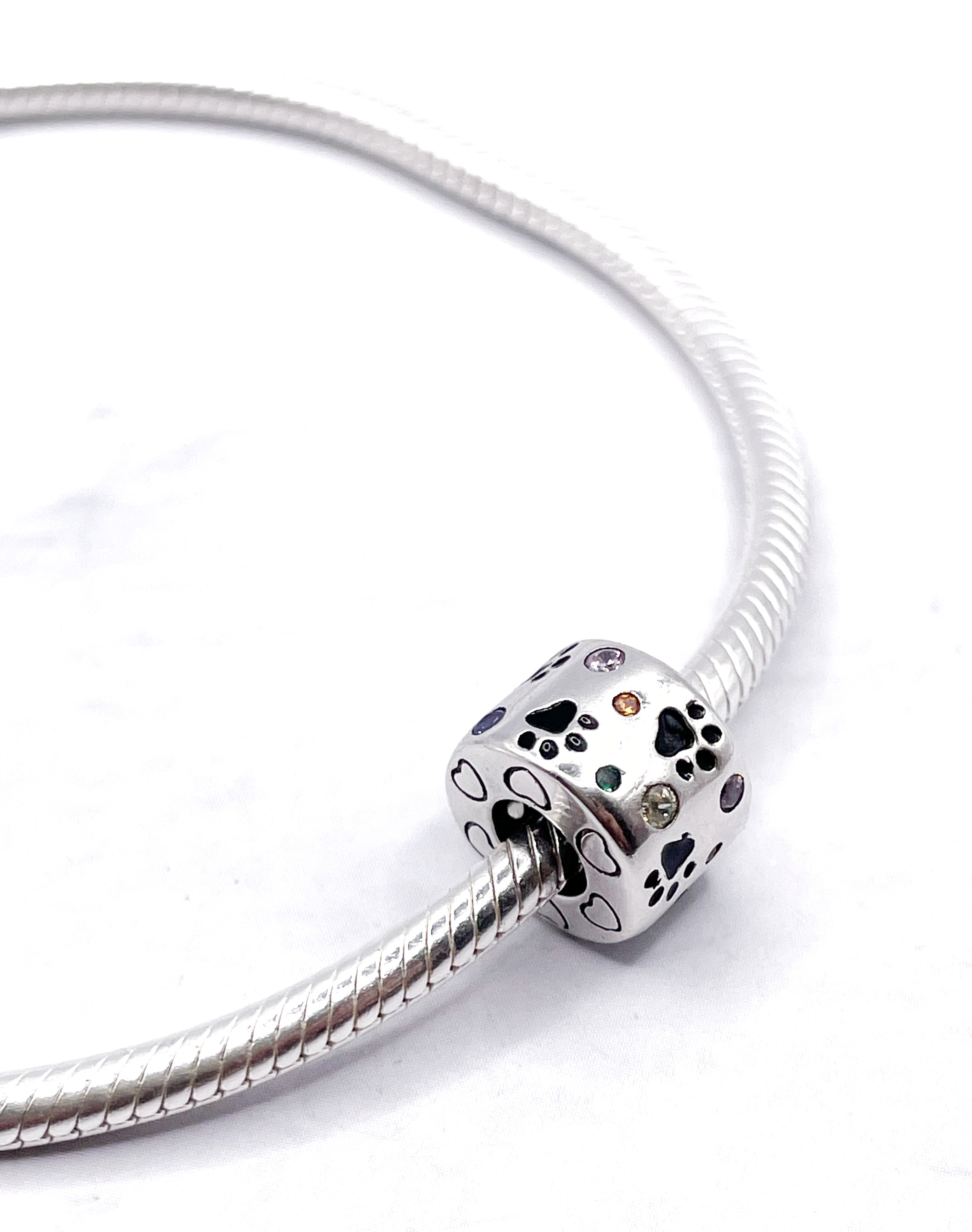 Charm Dije/separador móvil  huellitas con circonias