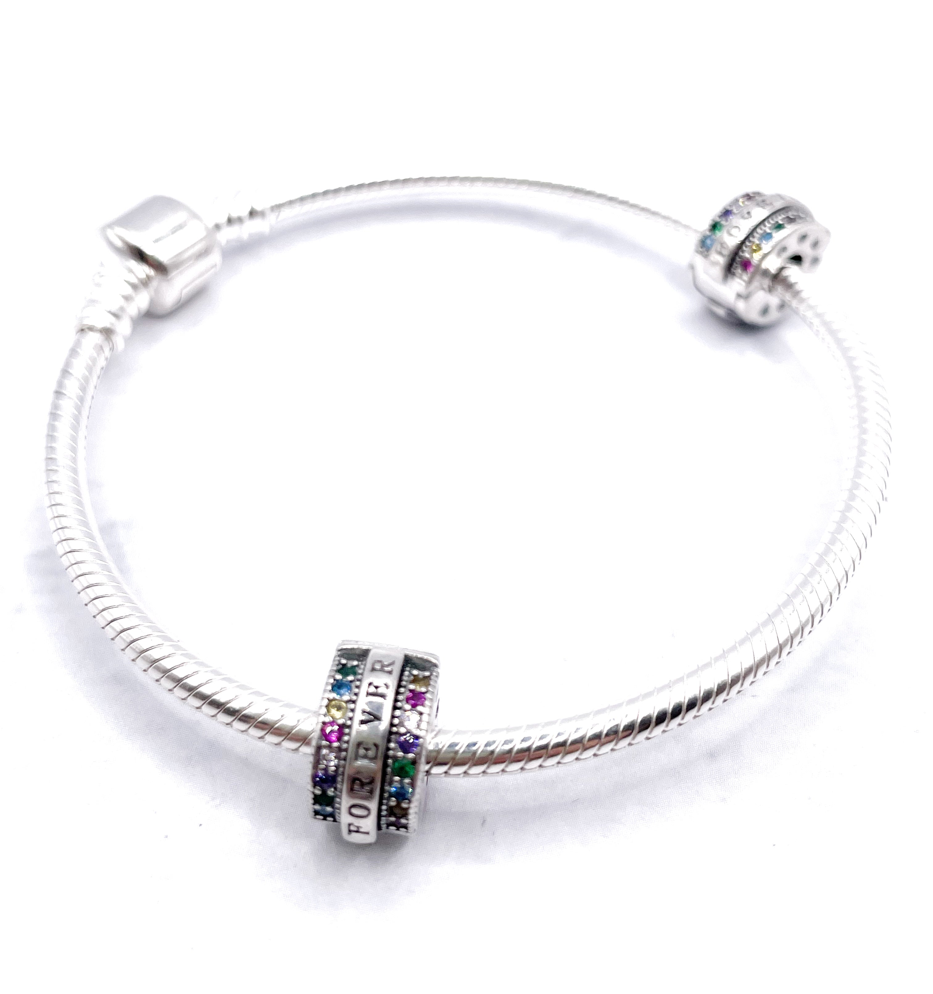 Charms Par de Fijadores clip Forever con bordes de circonias multicolores