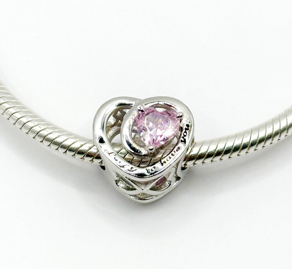 Charm Corazón “Suerte de tenerte” con circonia corazón rosada