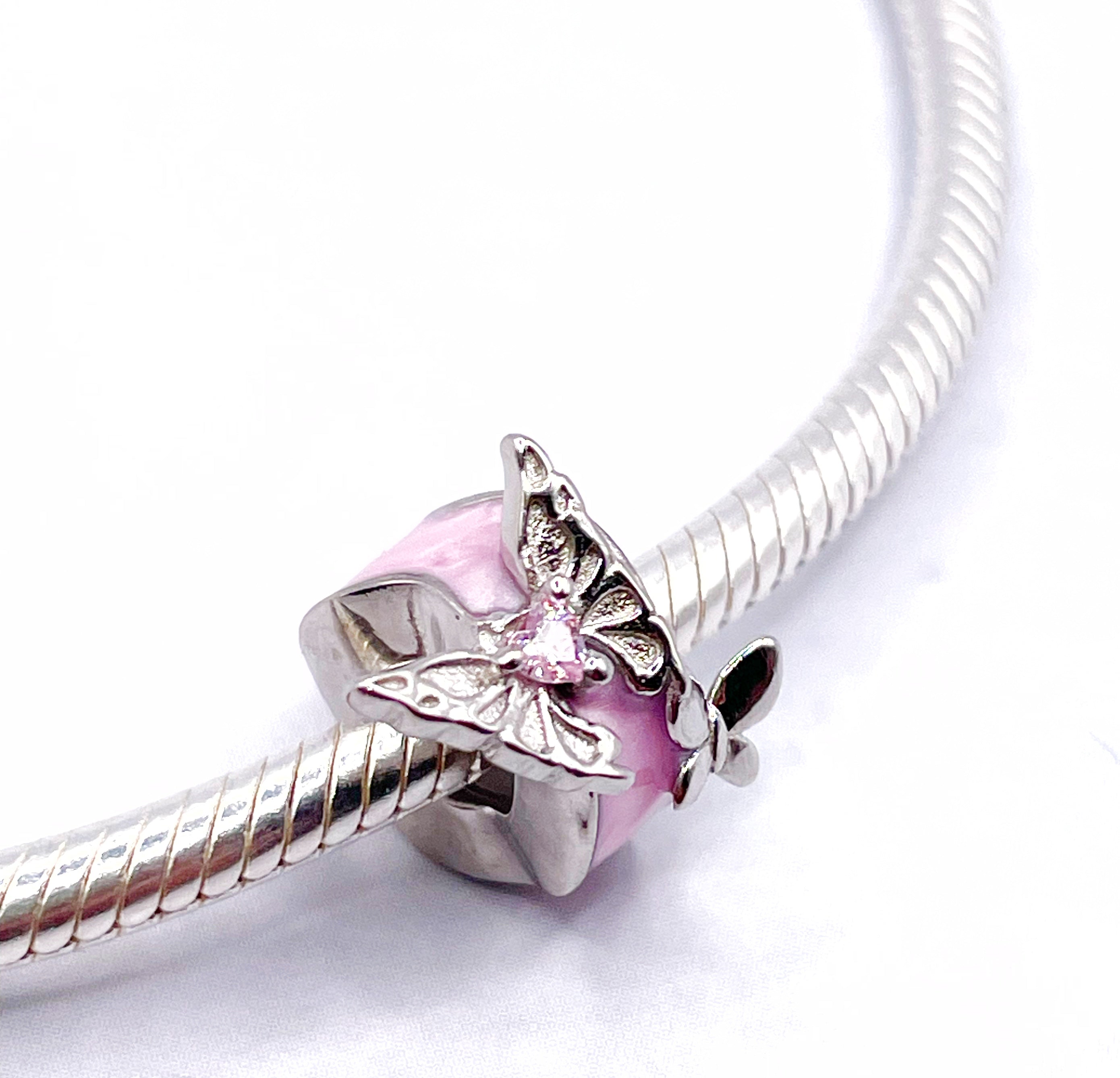 Charms Par de Fijadores esmaltados de mariposas con circonia rosada