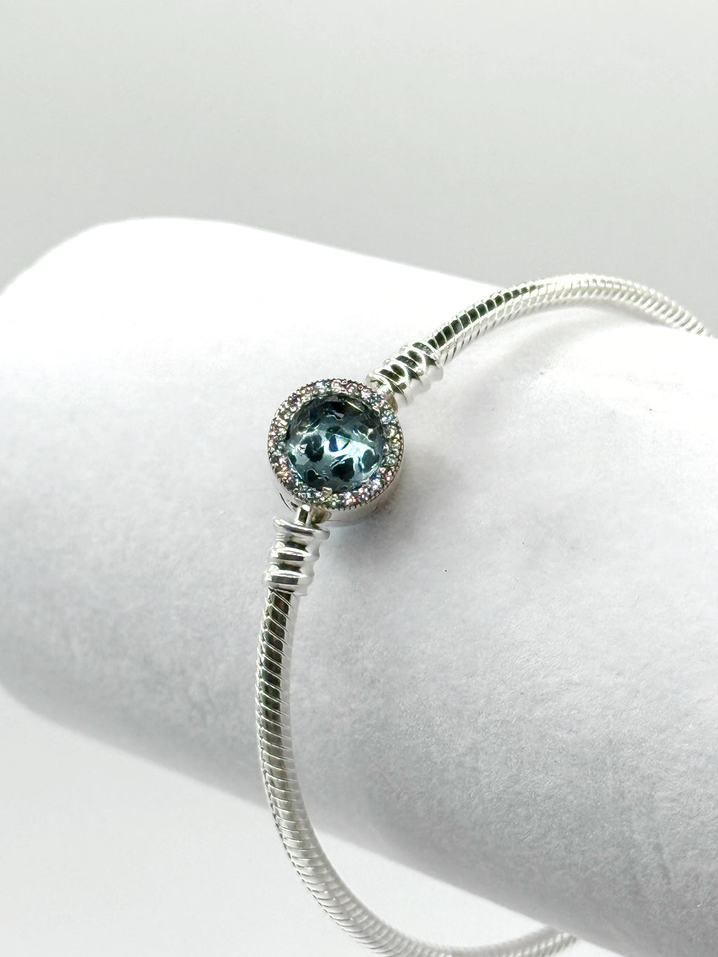 Pulsera flexible broche disco celeste de circonias