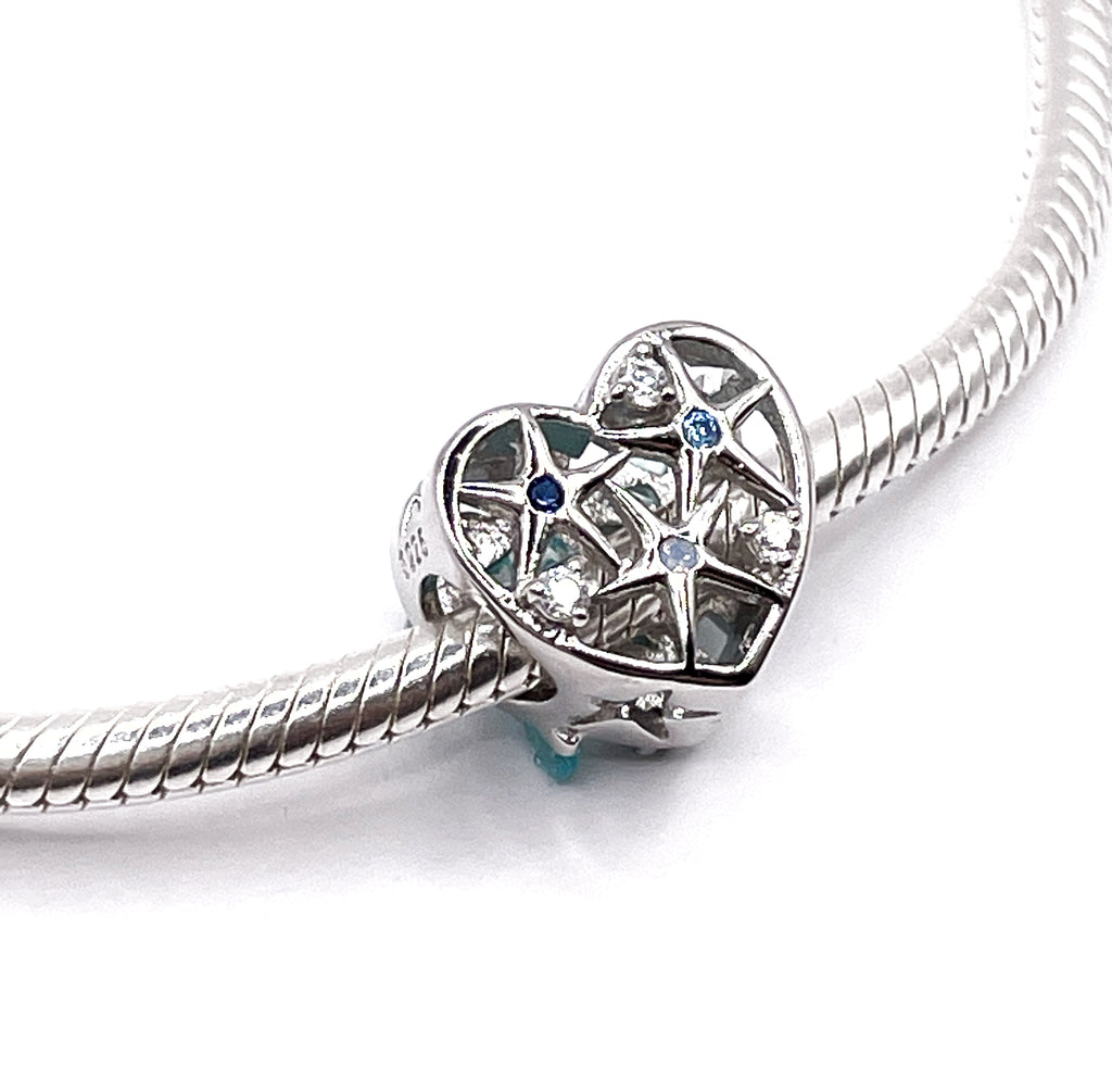 Charm Corazón con estrellas de mar