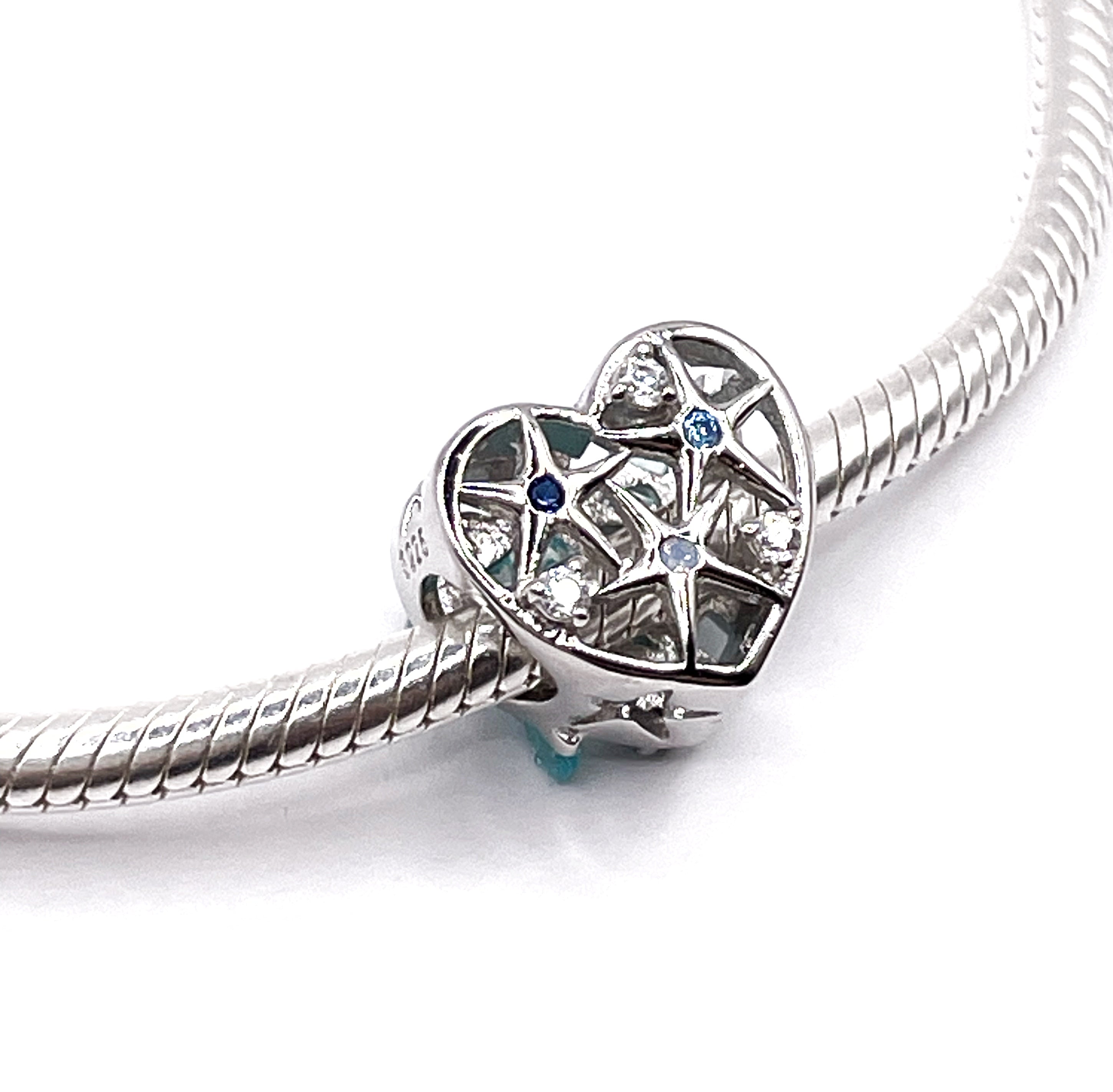 Charm Corazón con estrellas de mar