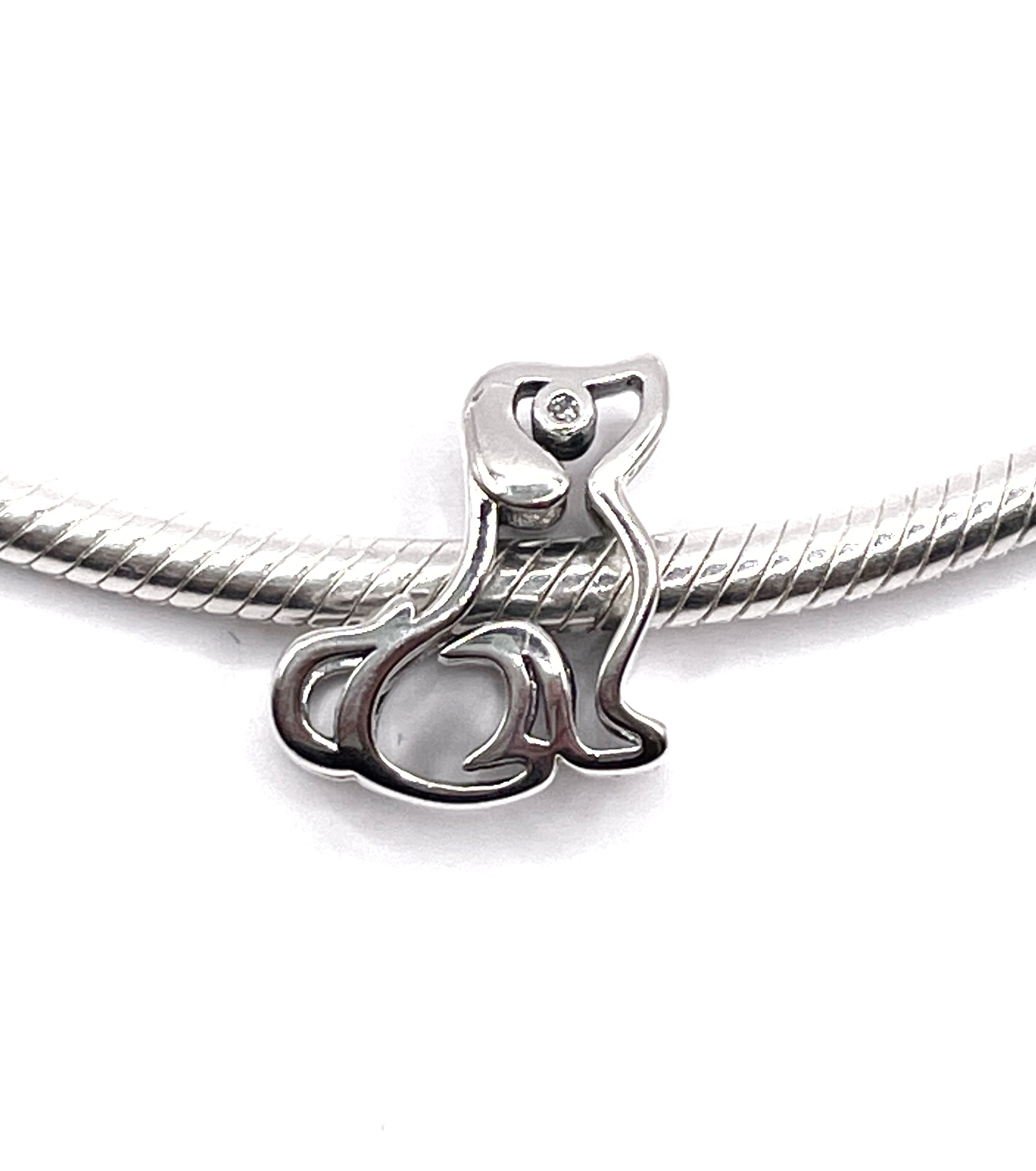 Charm Perro de filigrana con circonia blanca