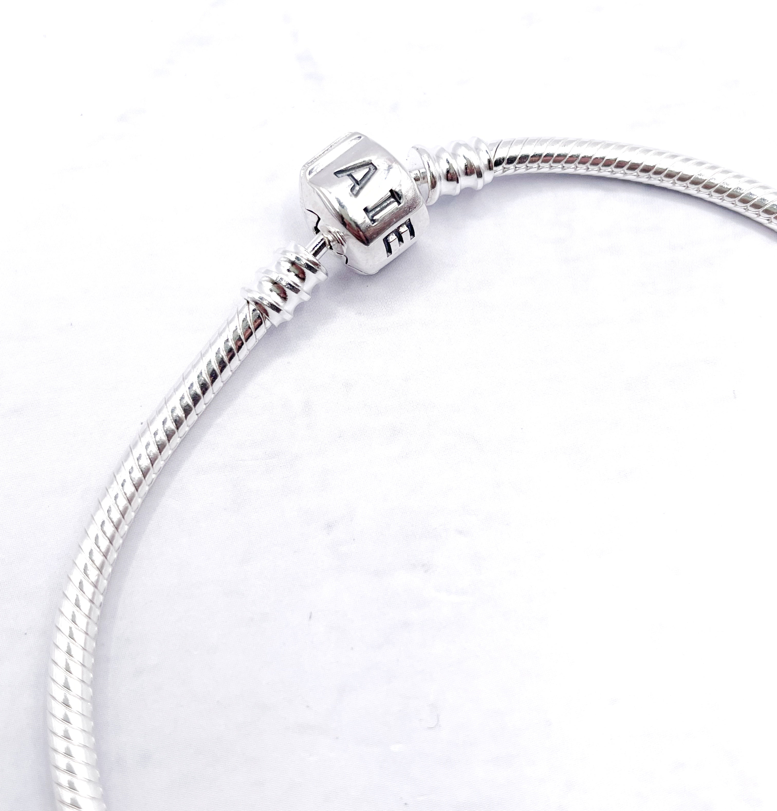 Pulsera flexible broche barril AIE