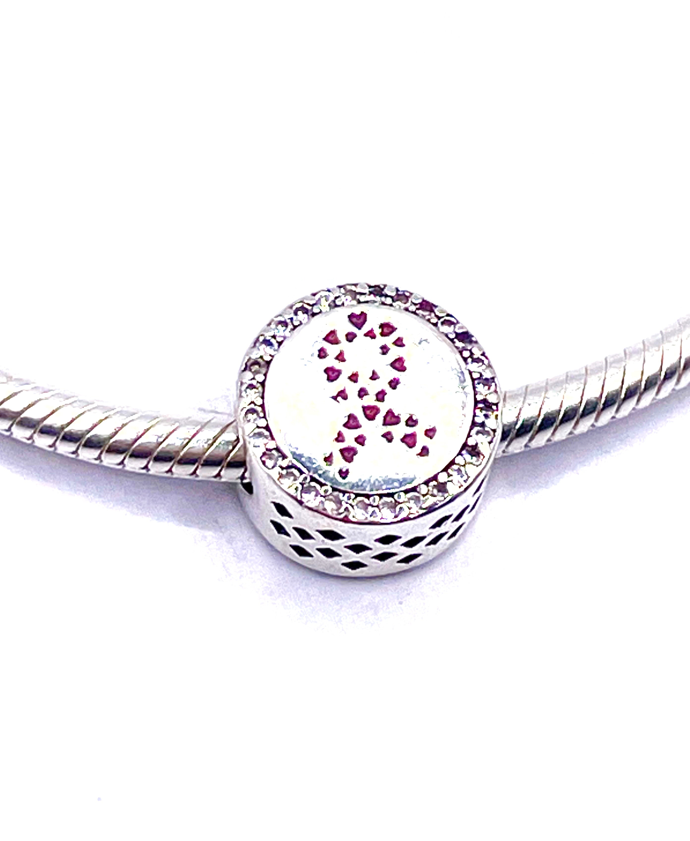 Charm Lazo rosa borde de circonias