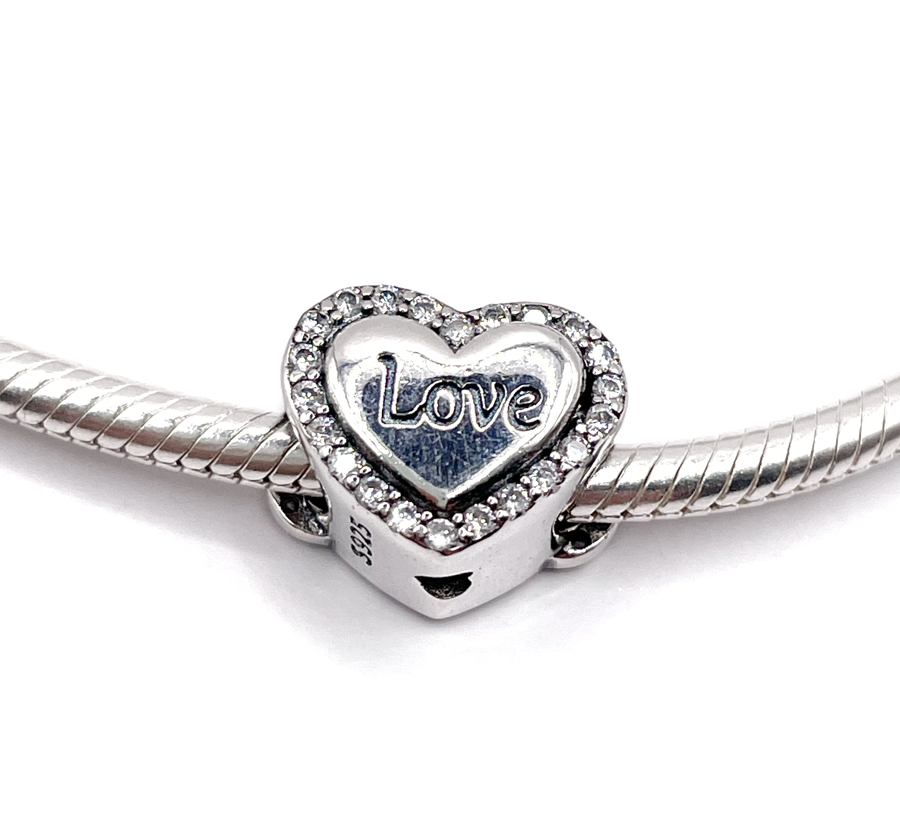 Charm Corazón rosado Love con infinito en circonias