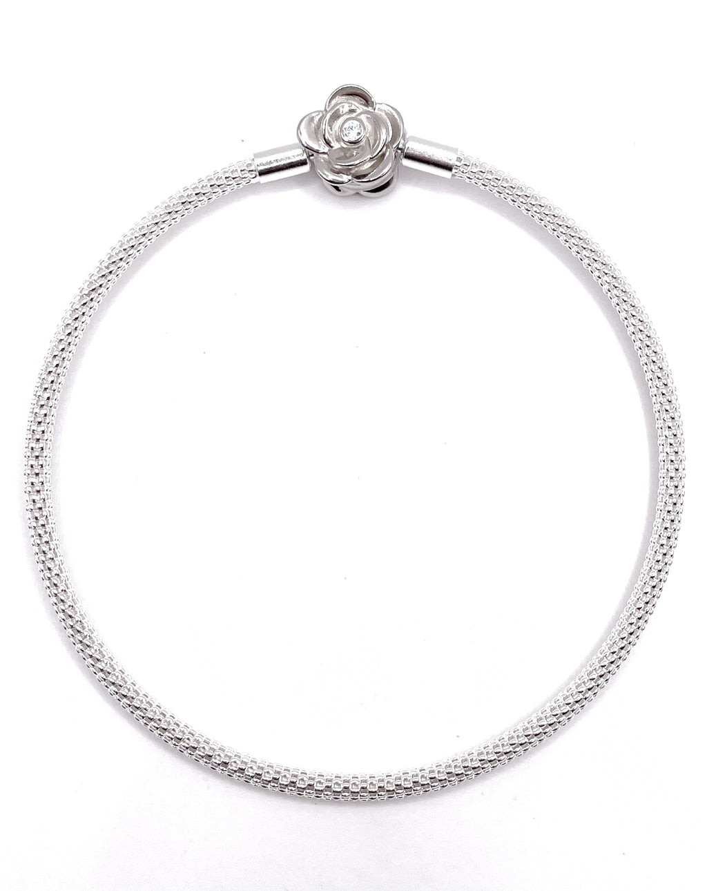 Pulsera rígida broche rosa