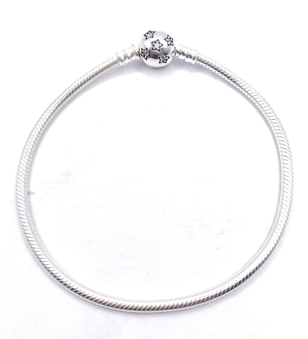 Pulsera flexible broche bolita estrellas