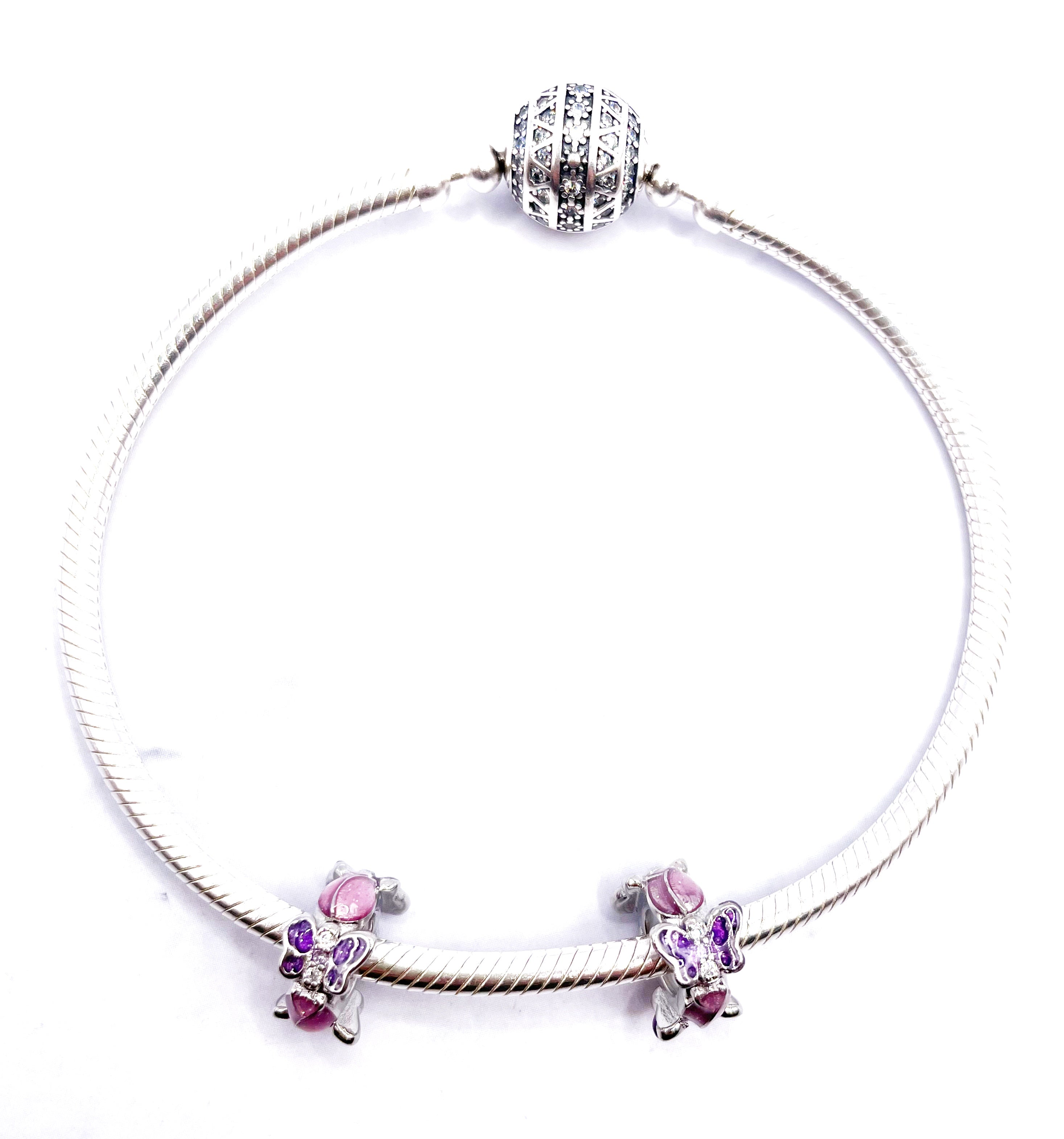 Charms Par de Fijadores de piedras y mariposas con circonias lilas