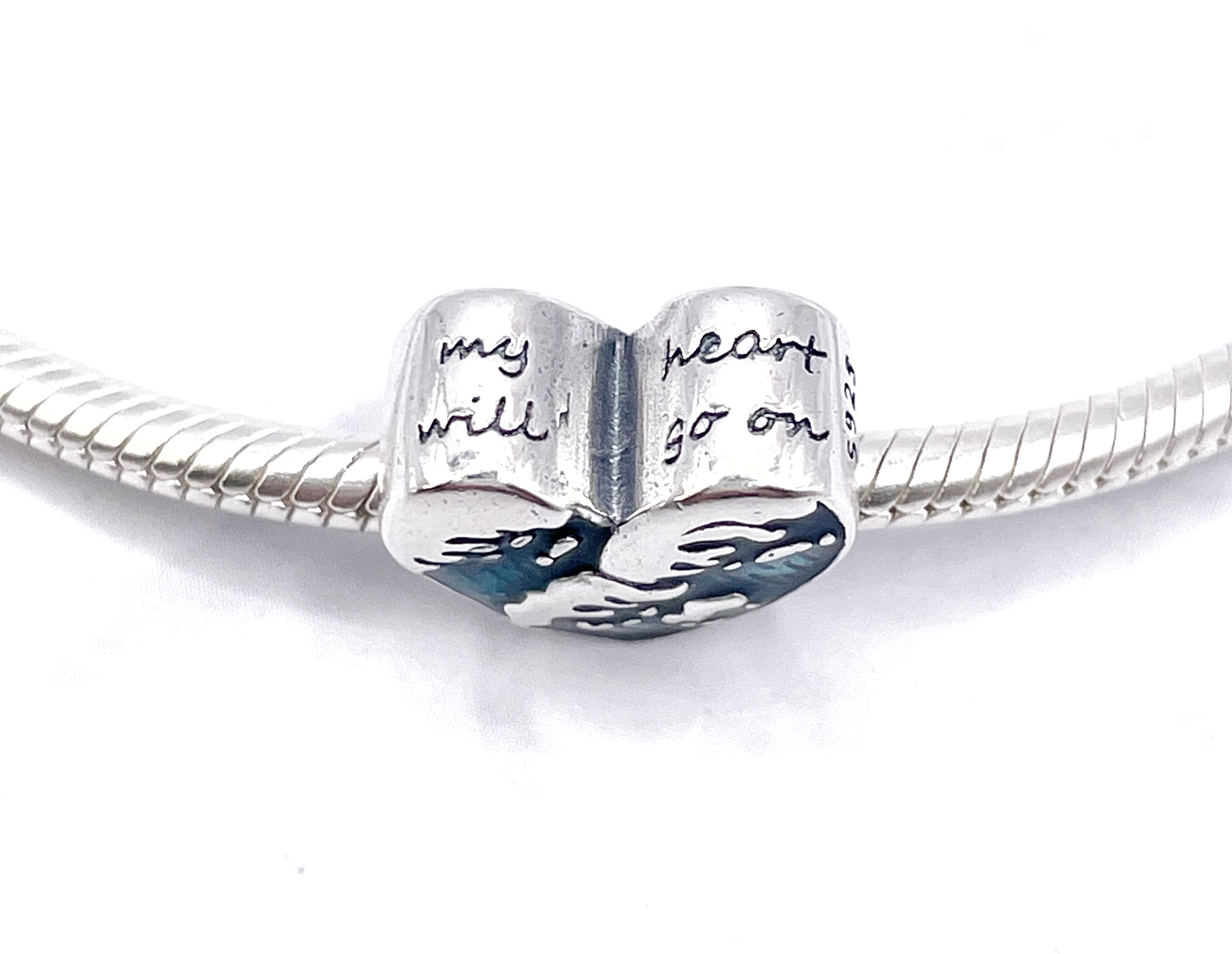 Charm Corazón olas “Mi corazón seguirá adelante”