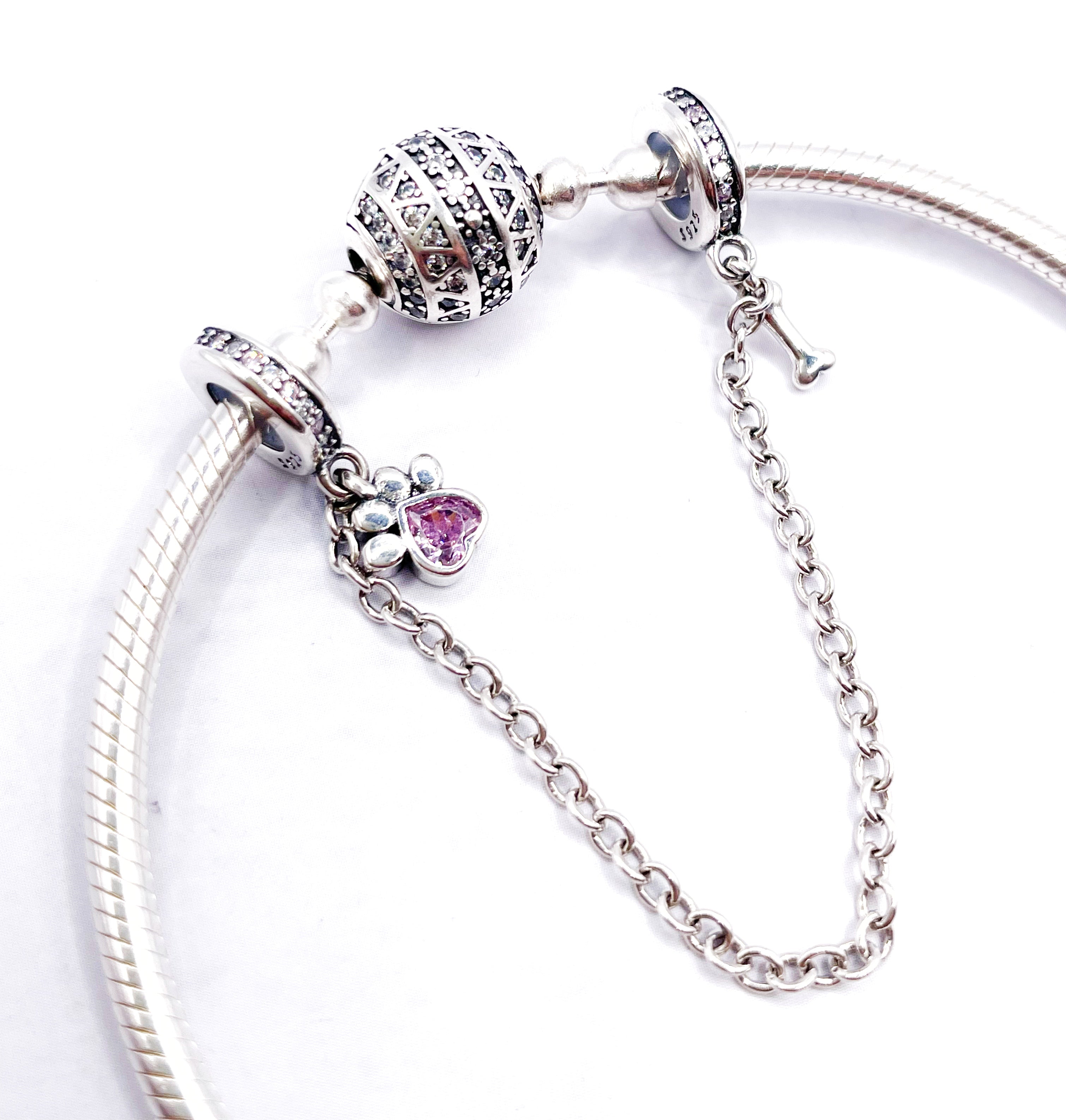 Cadena de seguridad de huellita y corazón