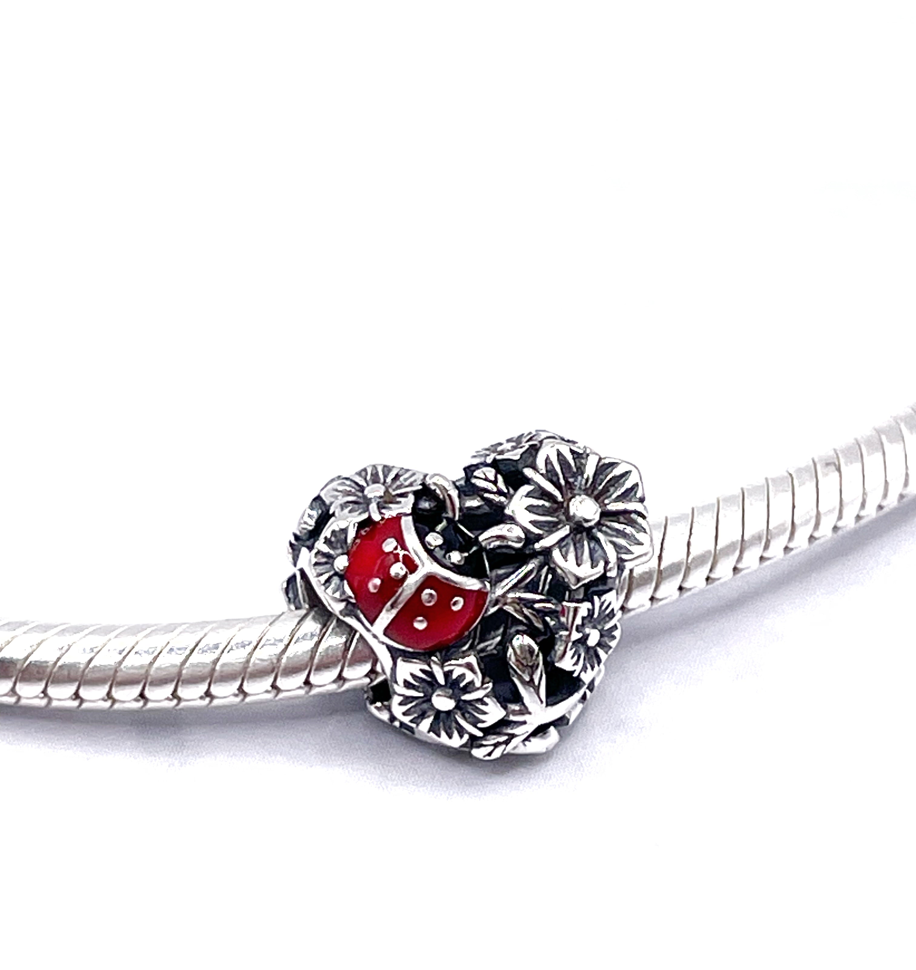 Charm Corazón San Antonio y flores