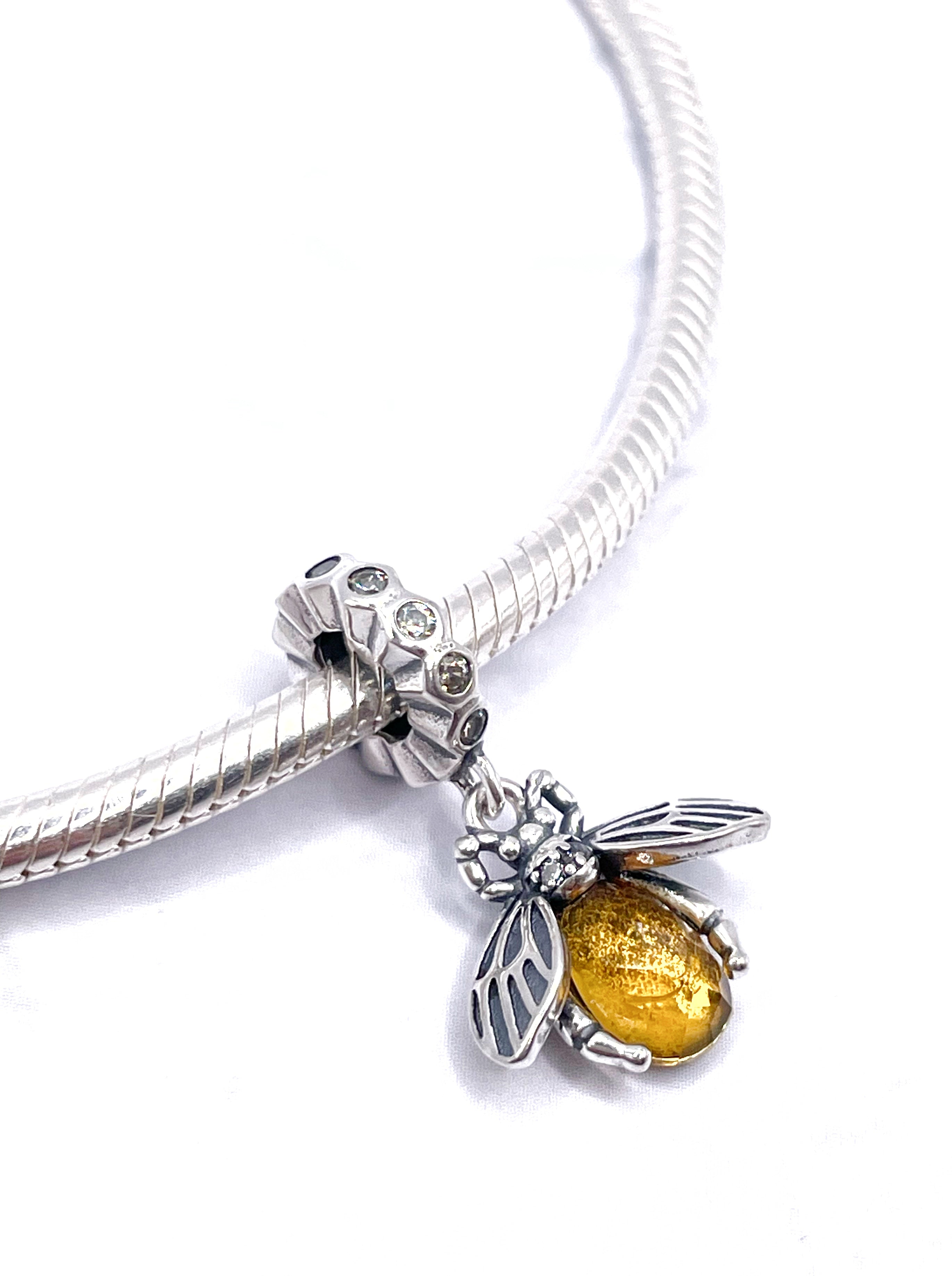 Charm Abeja con piedra facetada y circonias blancas