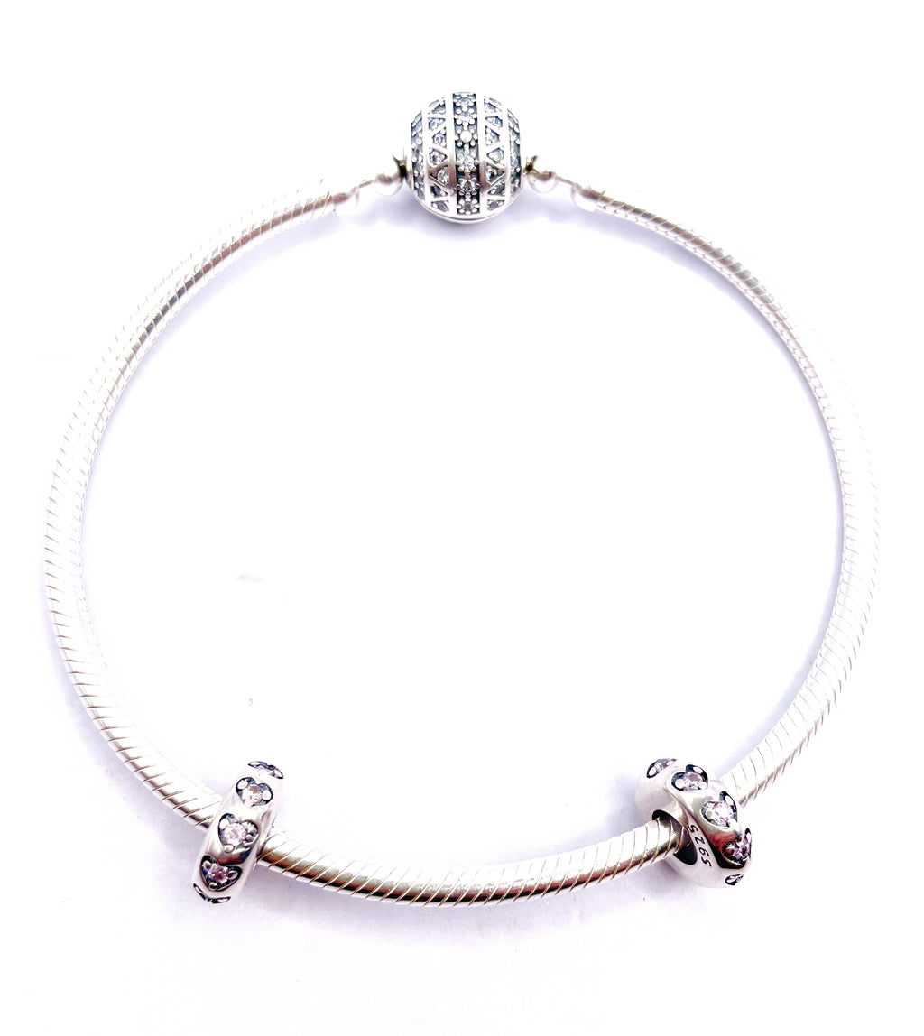 Charms Par de Fijadores de corazones con circonias rosadas