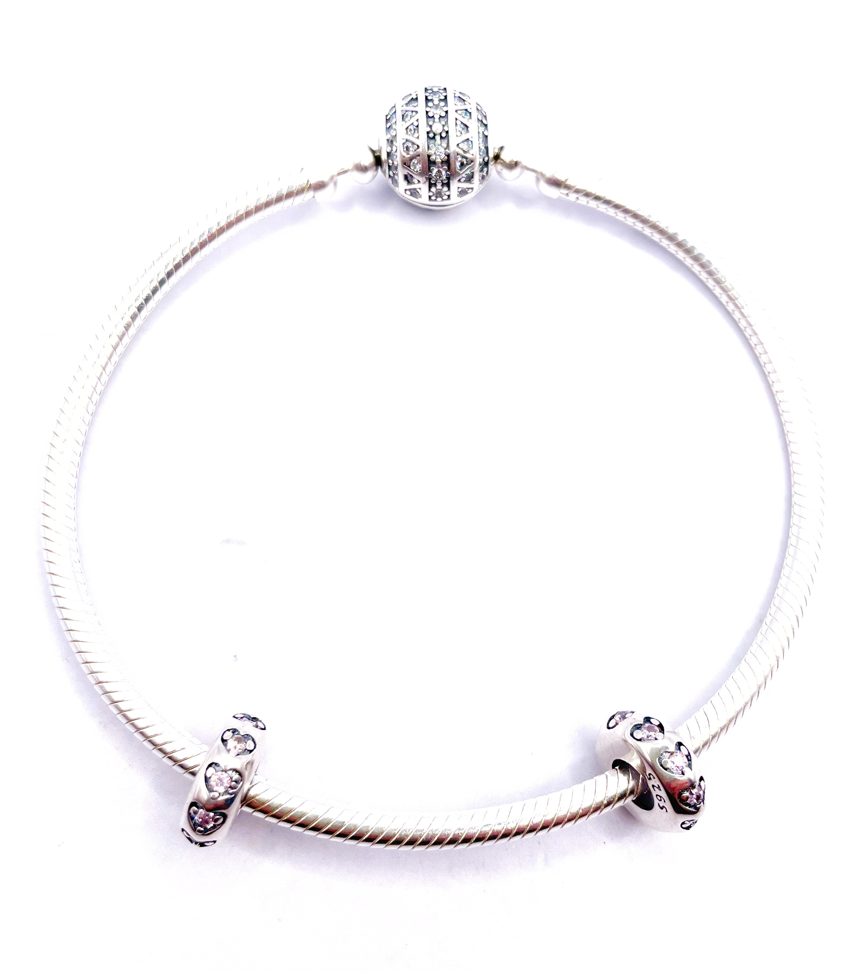 Charms Par de Fijadores de corazones con circonias rosadas