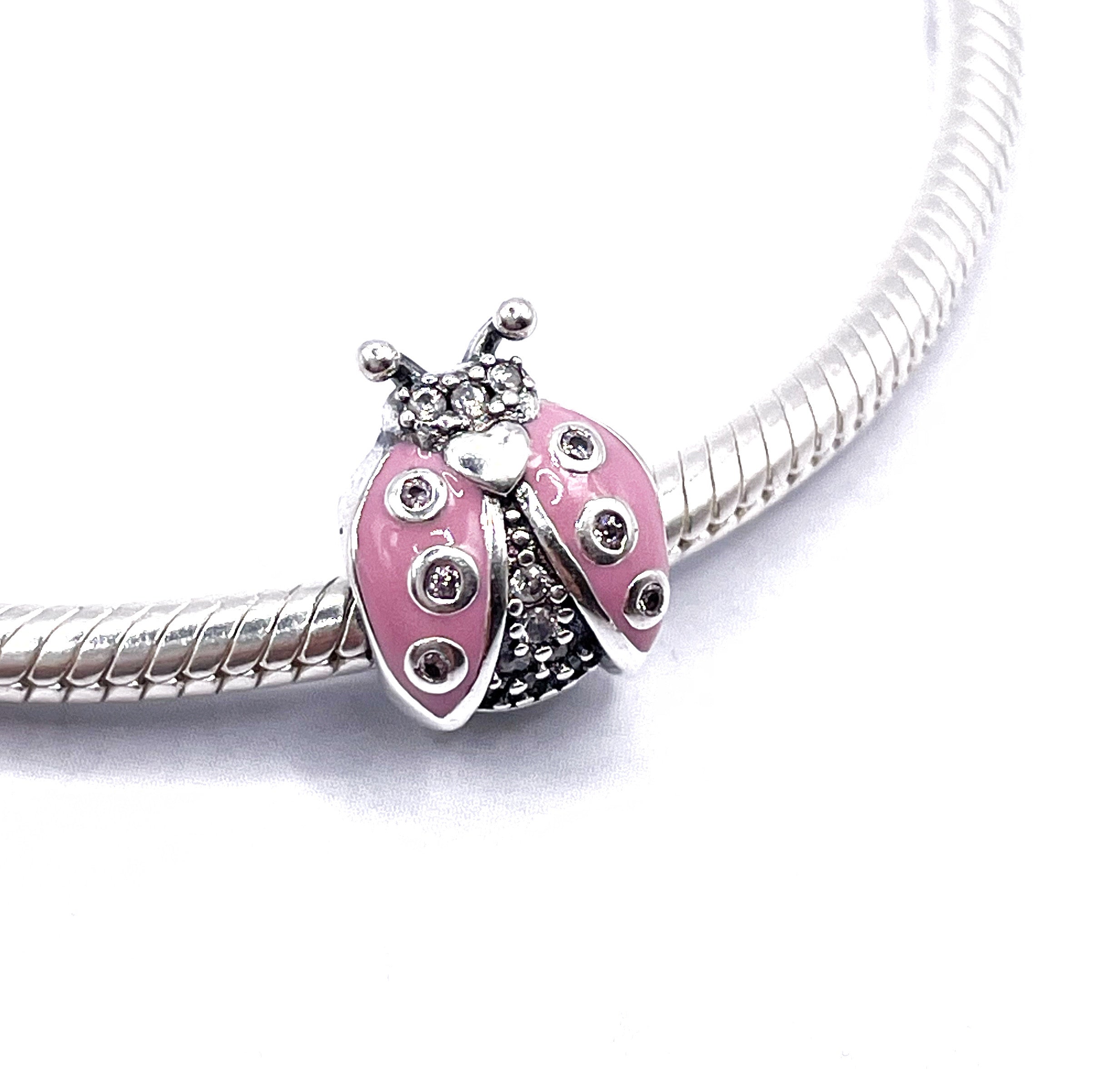 Charm San Antonio esmaltado rosado