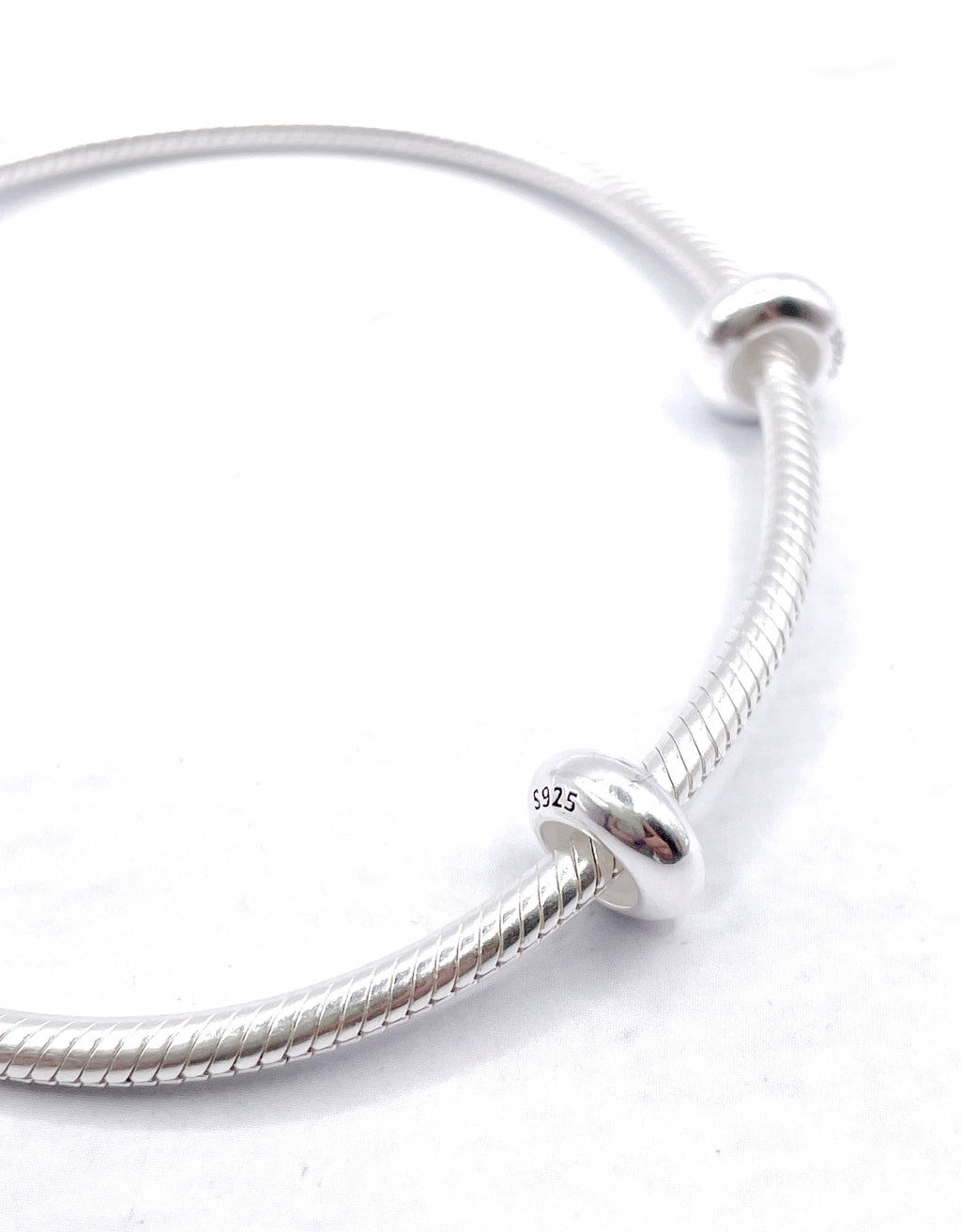 Charms Par de Fijadores lisos