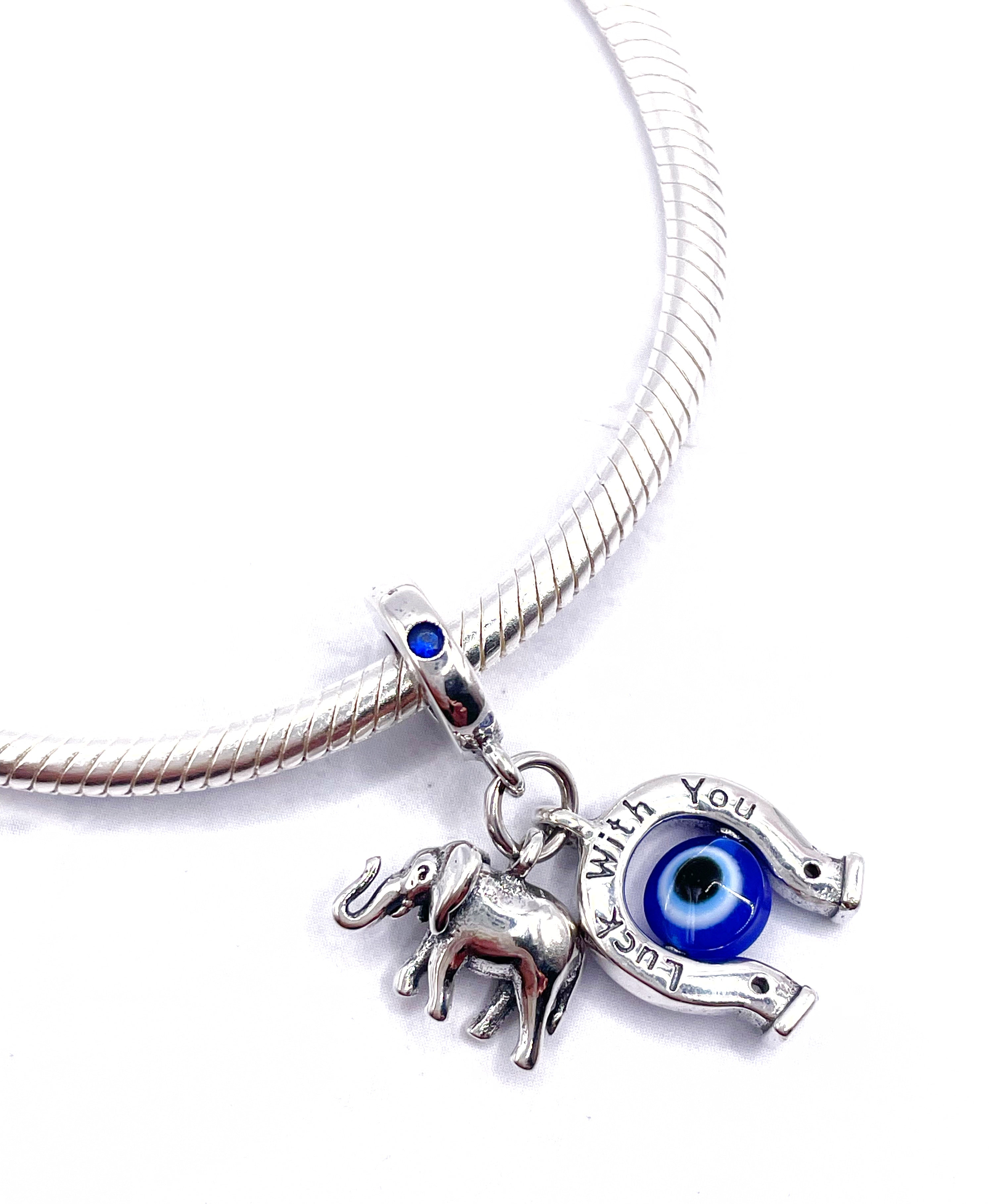 Charm Elefante y herradura con ojo turco