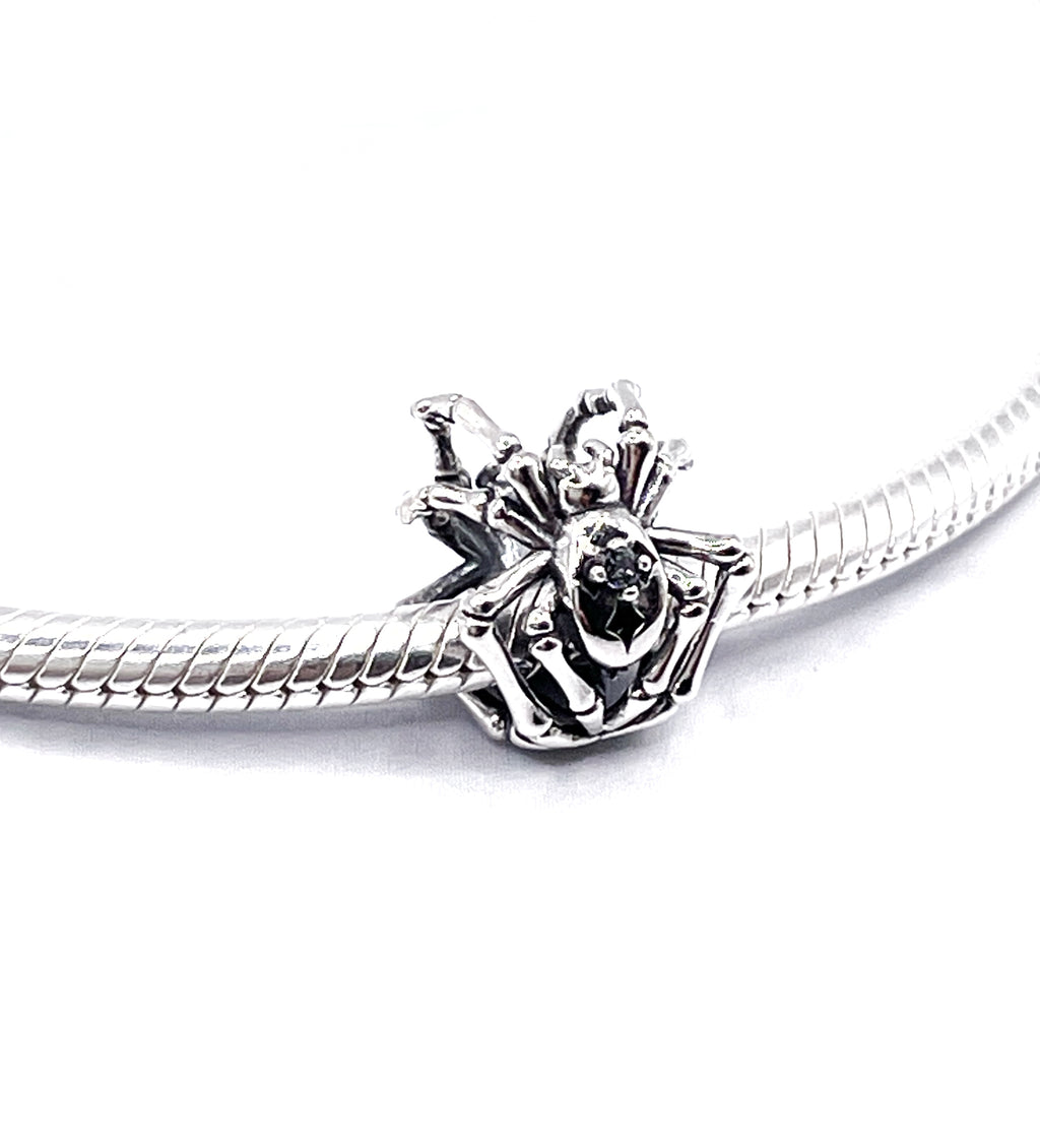 Charm Araña con cruz