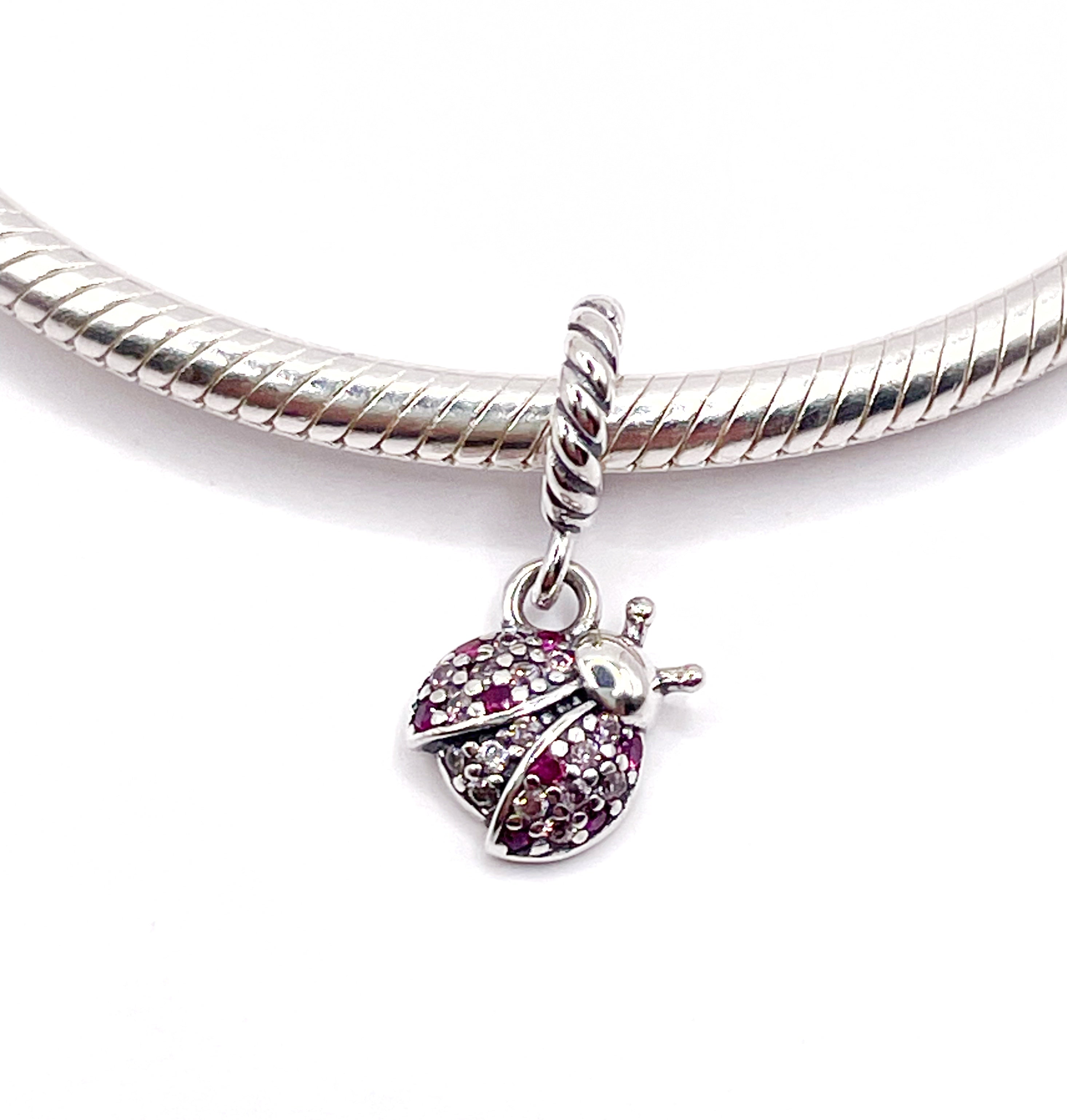 Charm San Antonio colgante de circonias rosadas