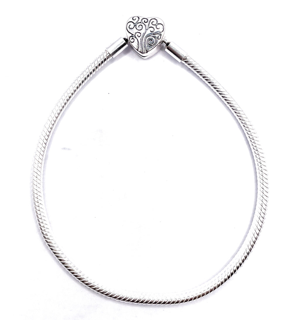 Pulsera flexible broche corazón labrado