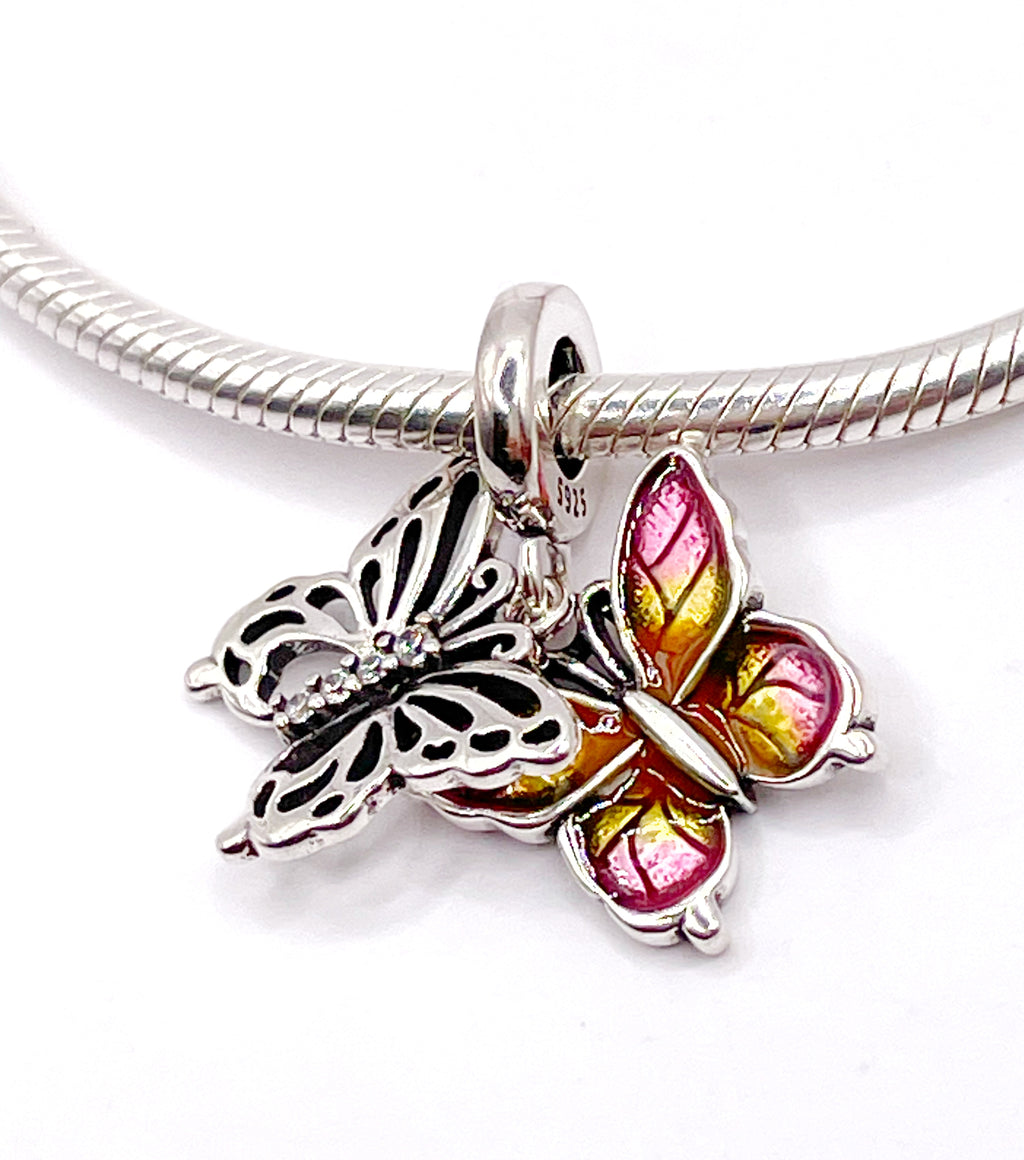 Charm Mariposa doble calada