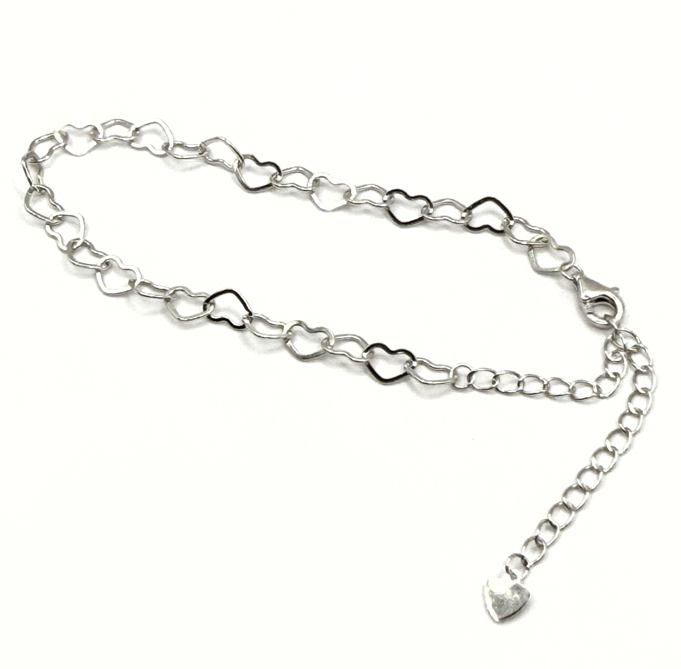 Pulsera de corazones ajustable