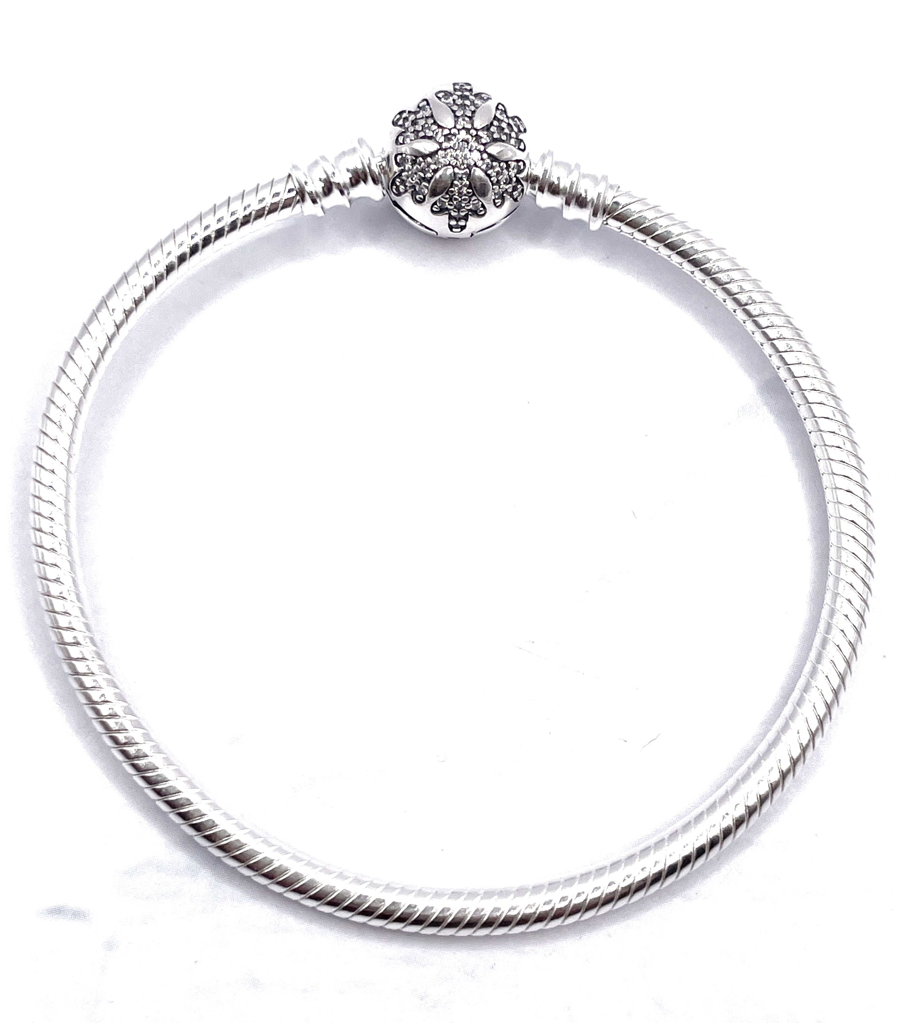 Pulsera flexible broche bolita copo de nieve