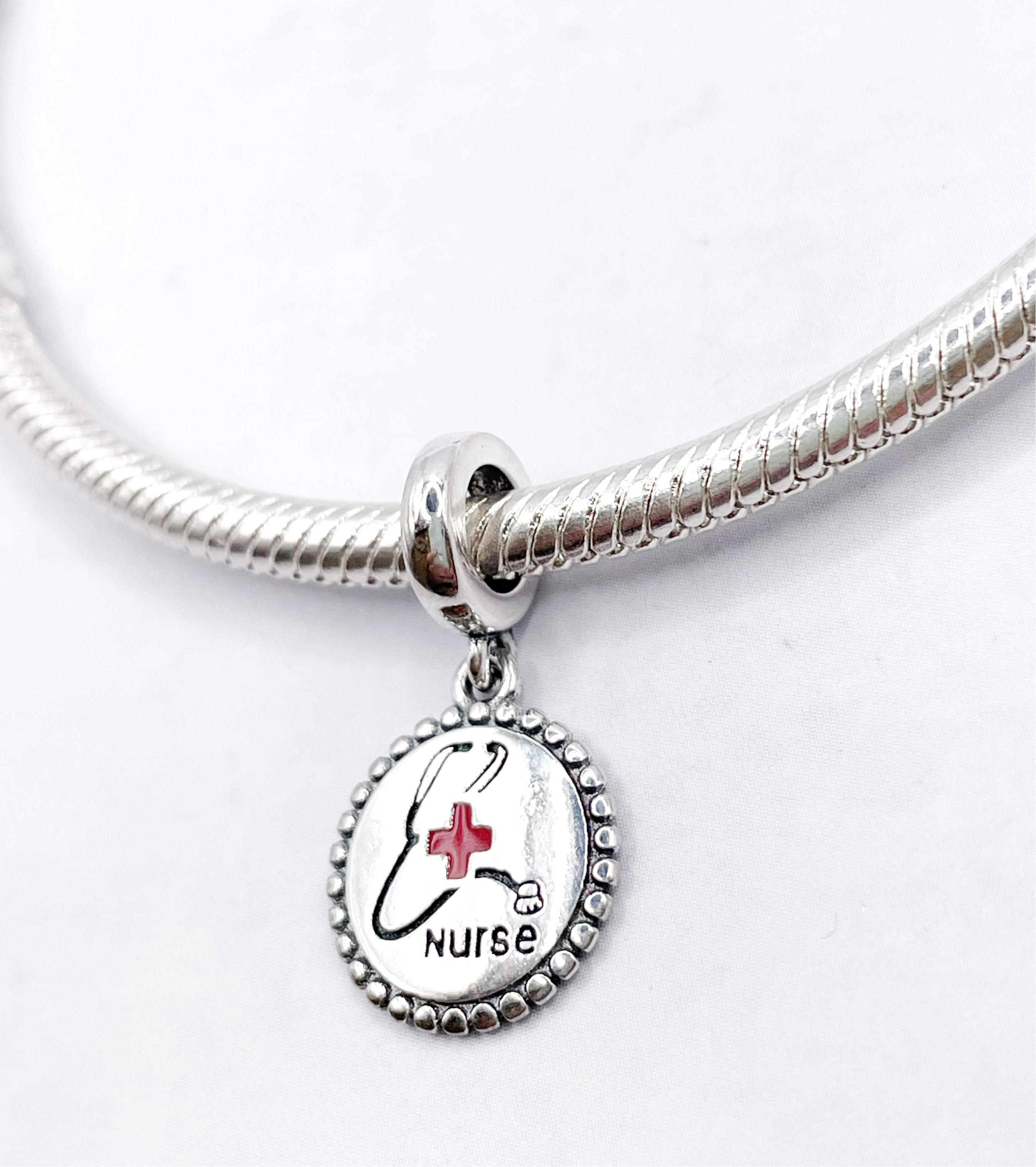 Charm Medalla nurse