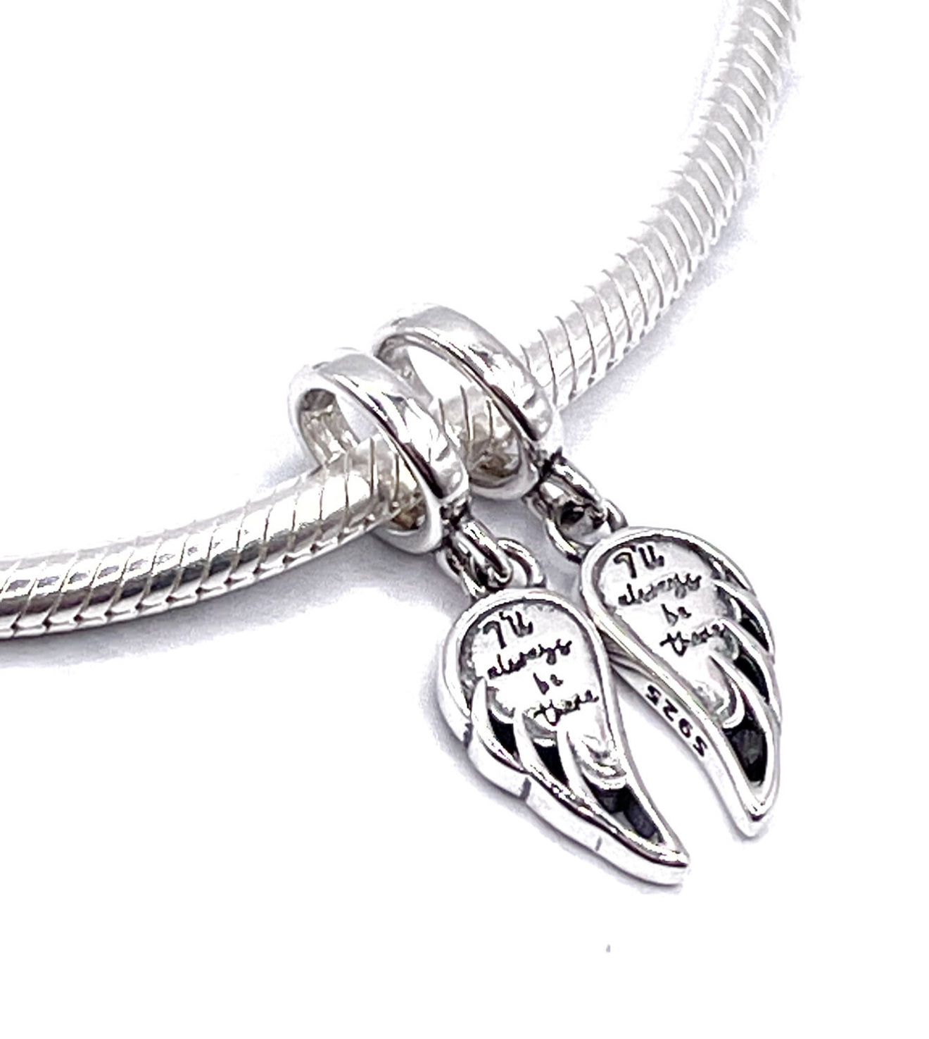 Charm Divisible alas “Siempre estaré allí”