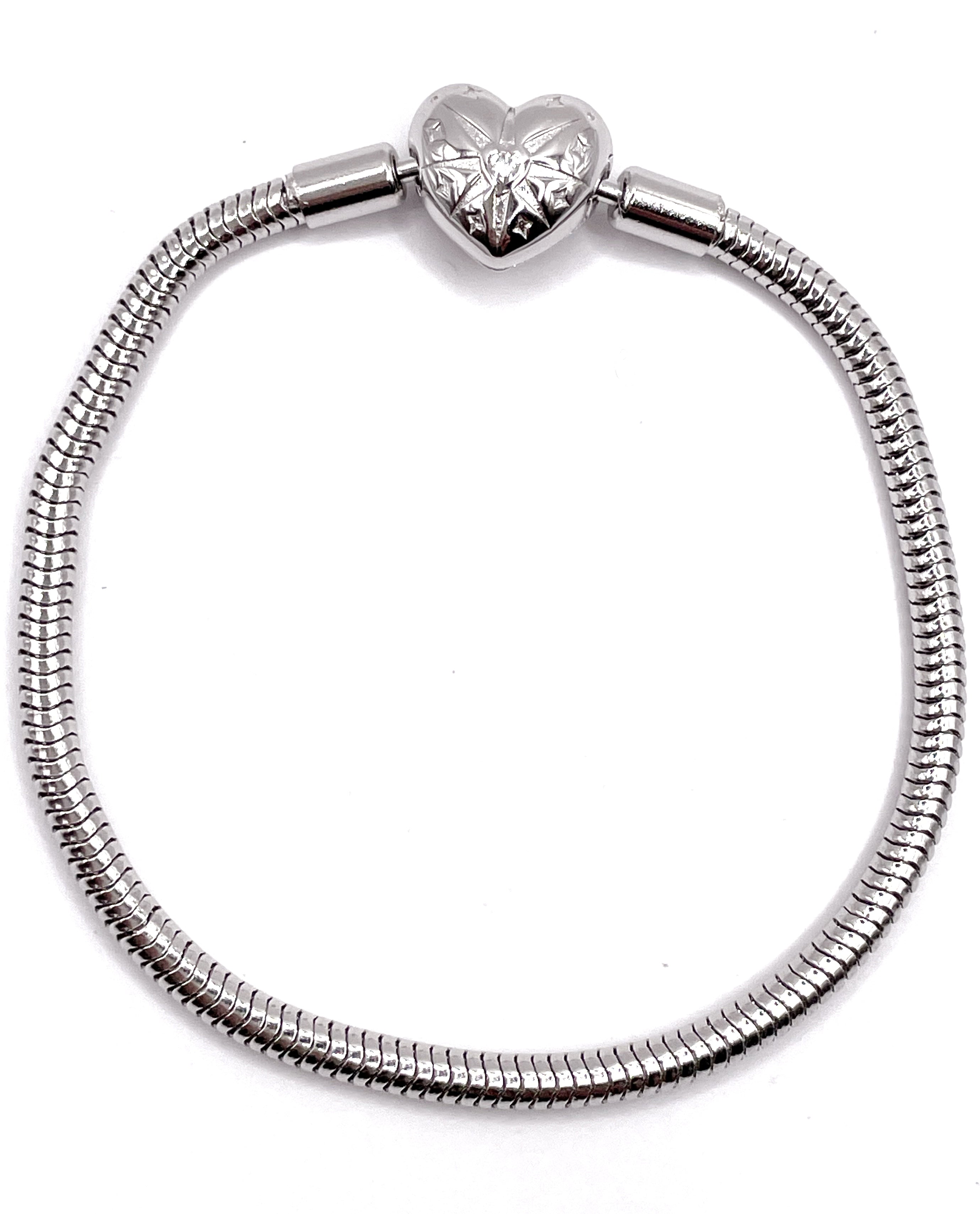 Pulsera flexible broche corazón brújula