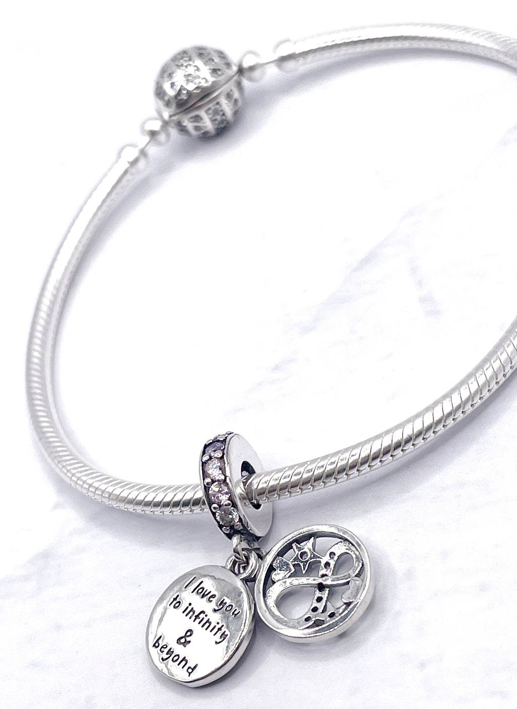 Charm Medalla violeta infinito “Te amo hasta el infinito y más allá”