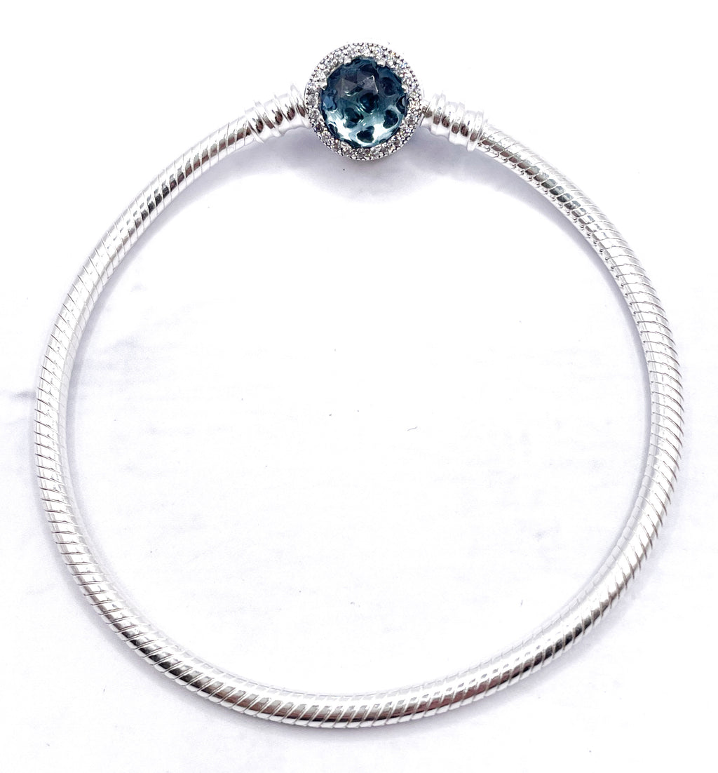 Pulsera flexible broche disco celeste de circonias