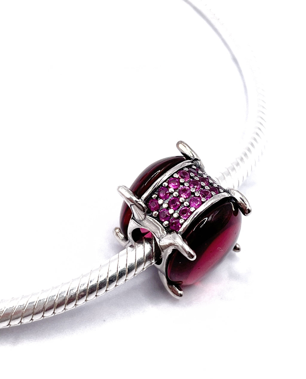 Charm Cabujón ovalado rosa fucsia