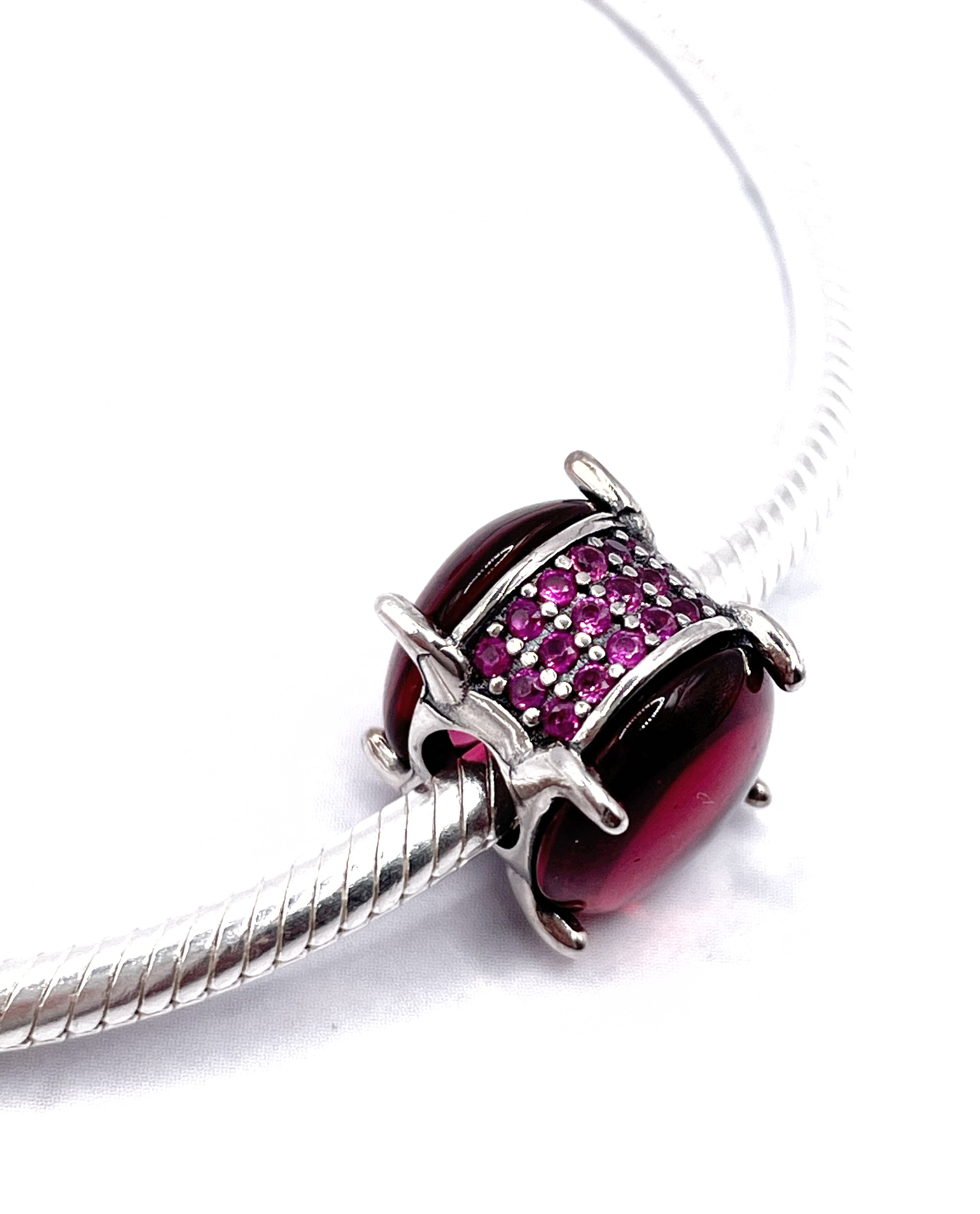 Charm Cabujón ovalado rosa fucsia