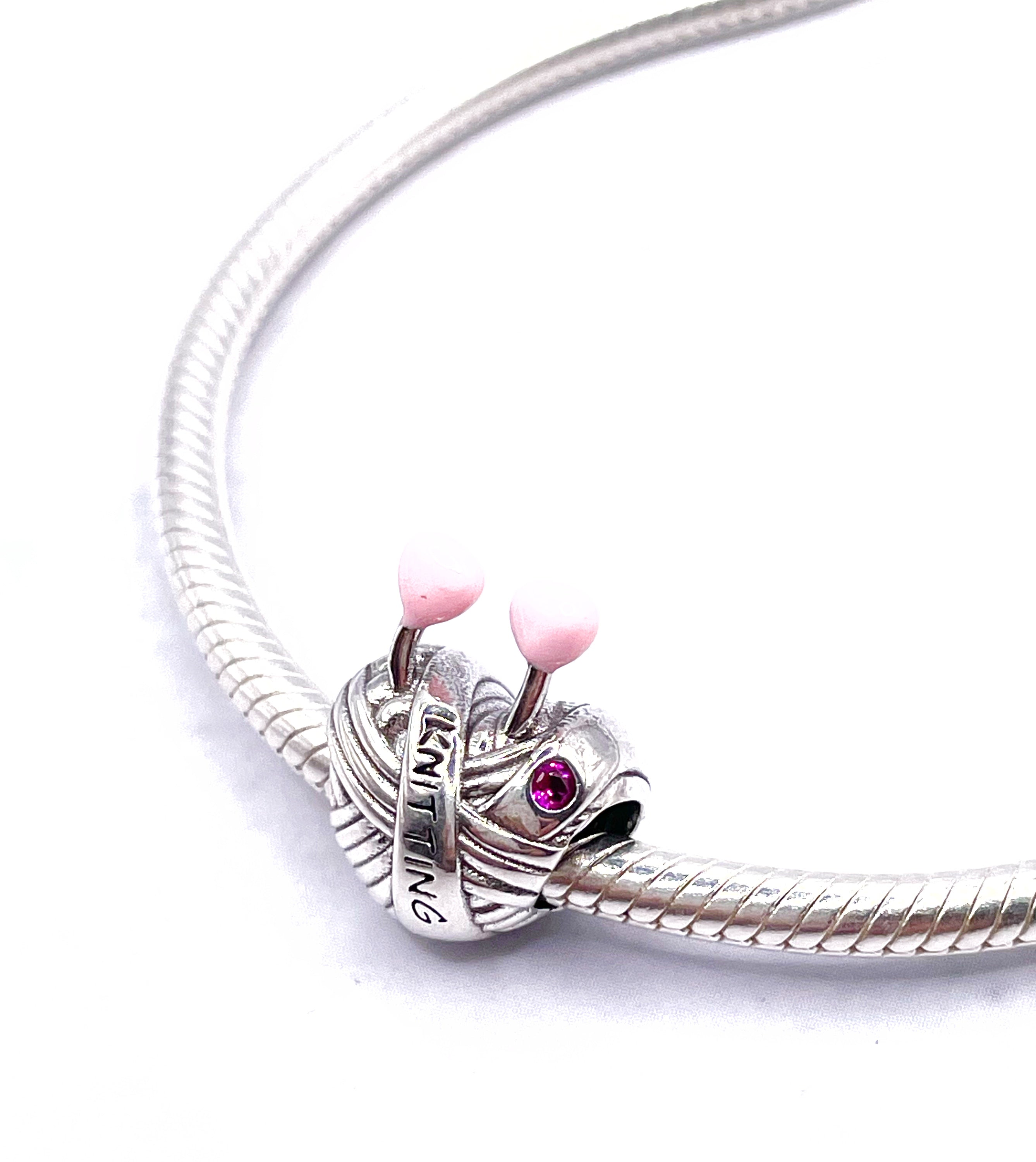 Charm Corazón de tejido rosado