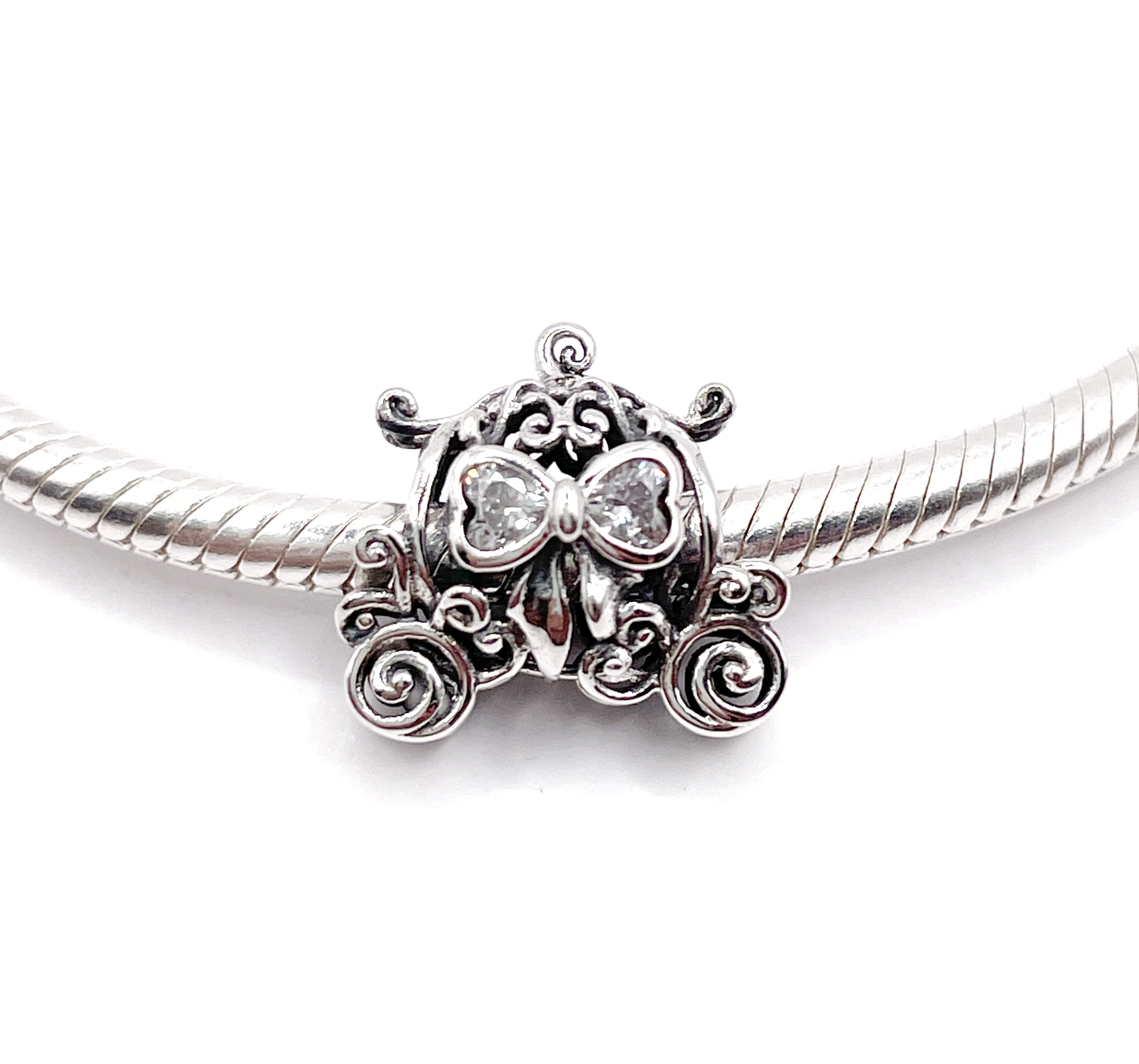 Charm Carroza con moño