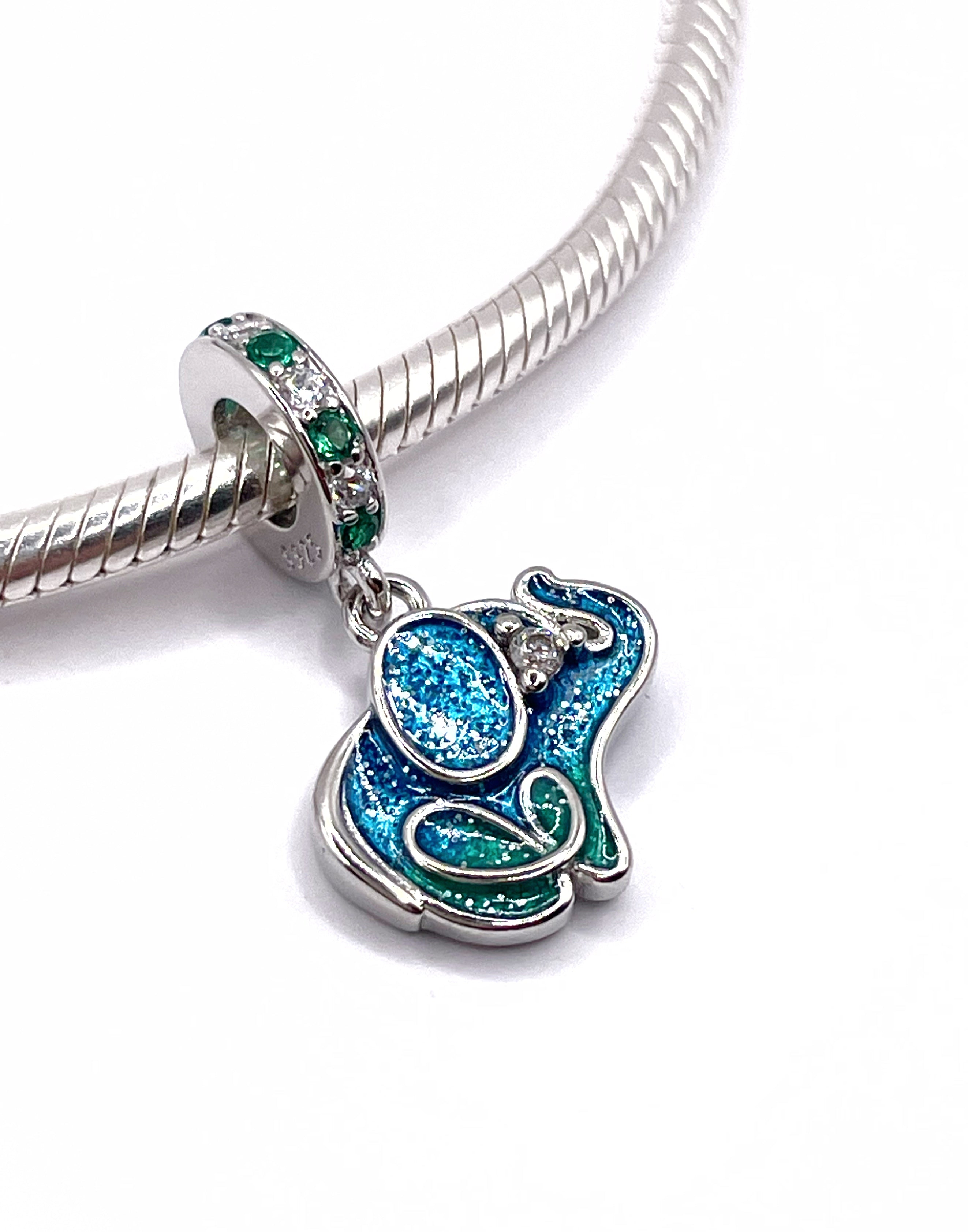 Charm Elefante colgante celeste y verde