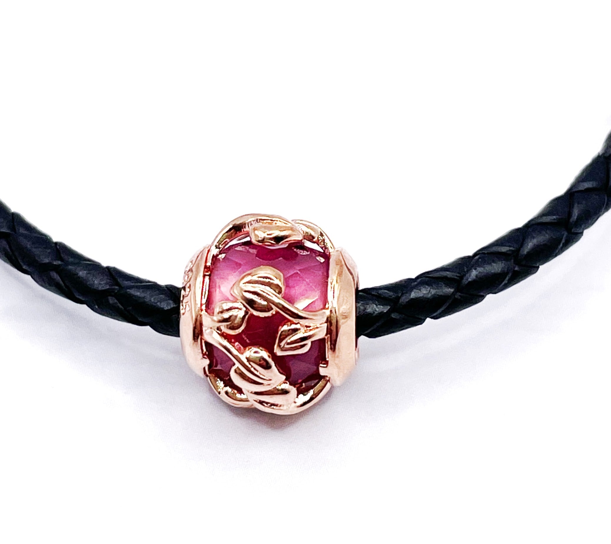 Charm Bolita de piedra facetada y hojas rose gold