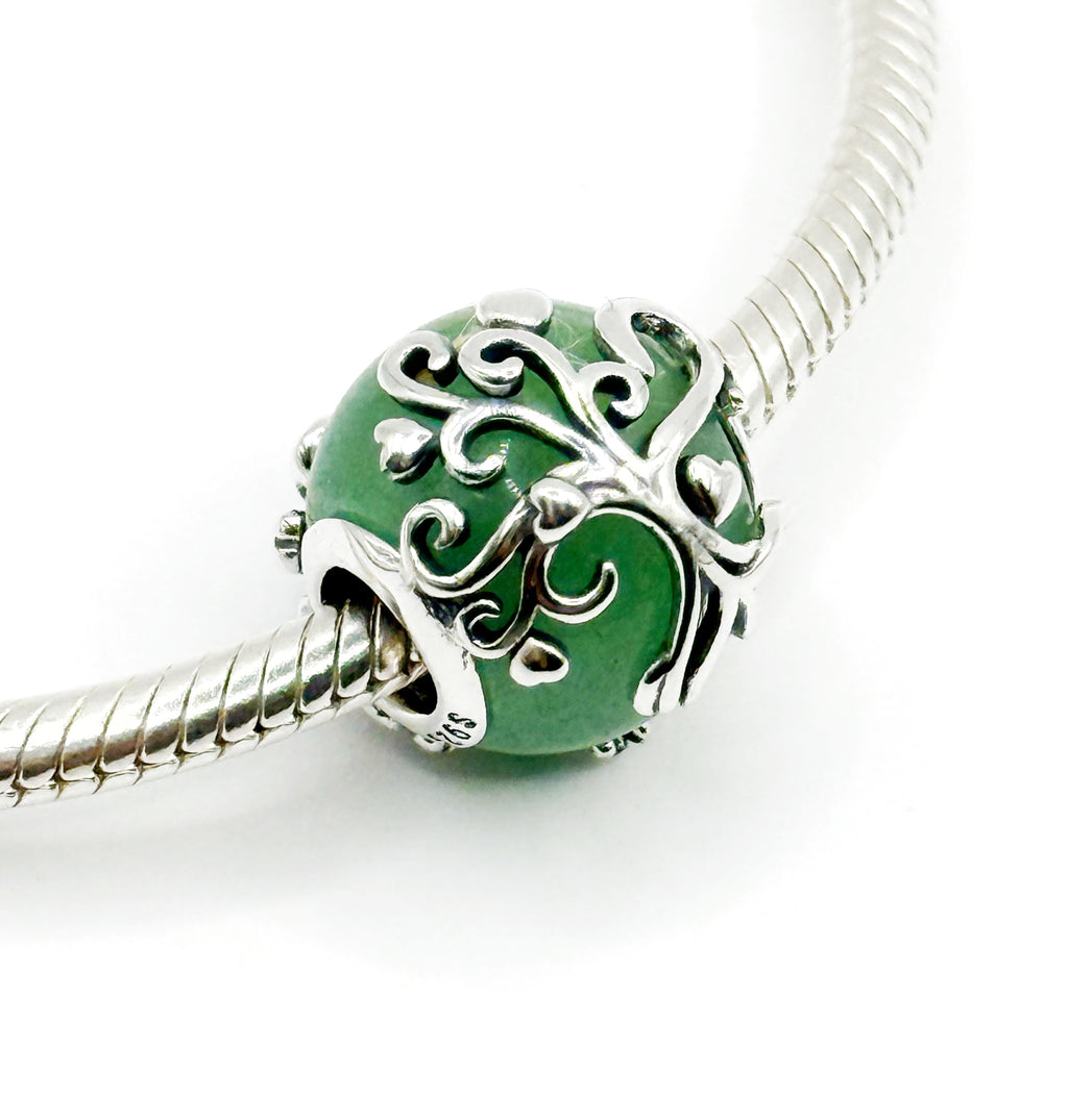 Charm Bolita verde con árbol de la vida