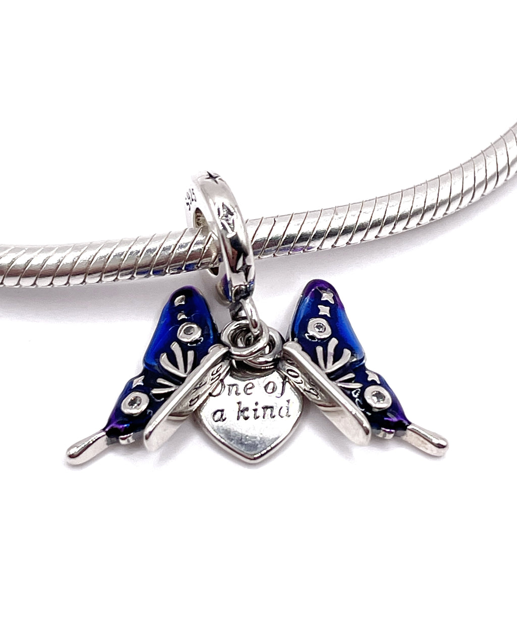 Charm Mariposa azul “Únic@“