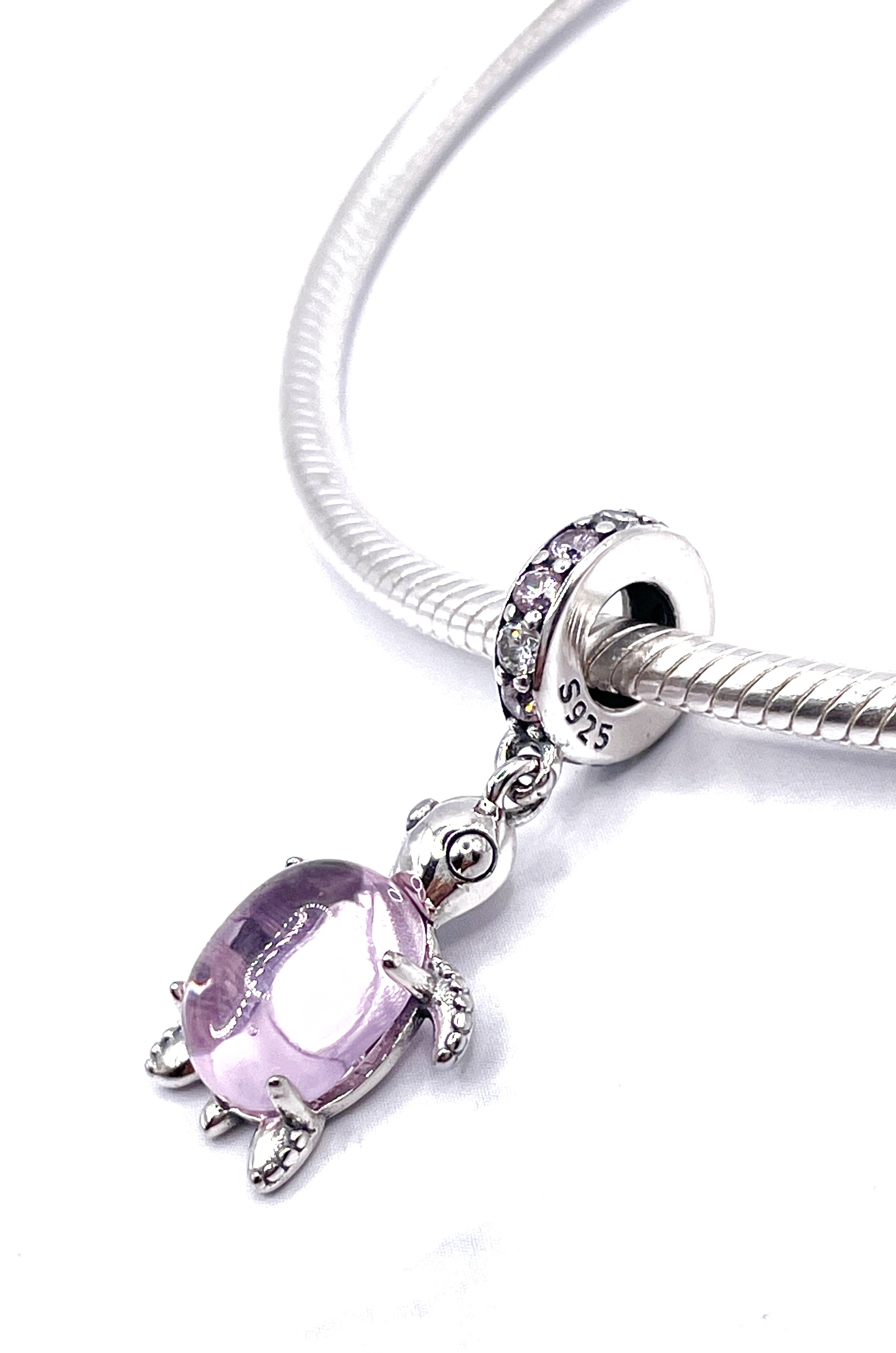 Charm Tortuga lila