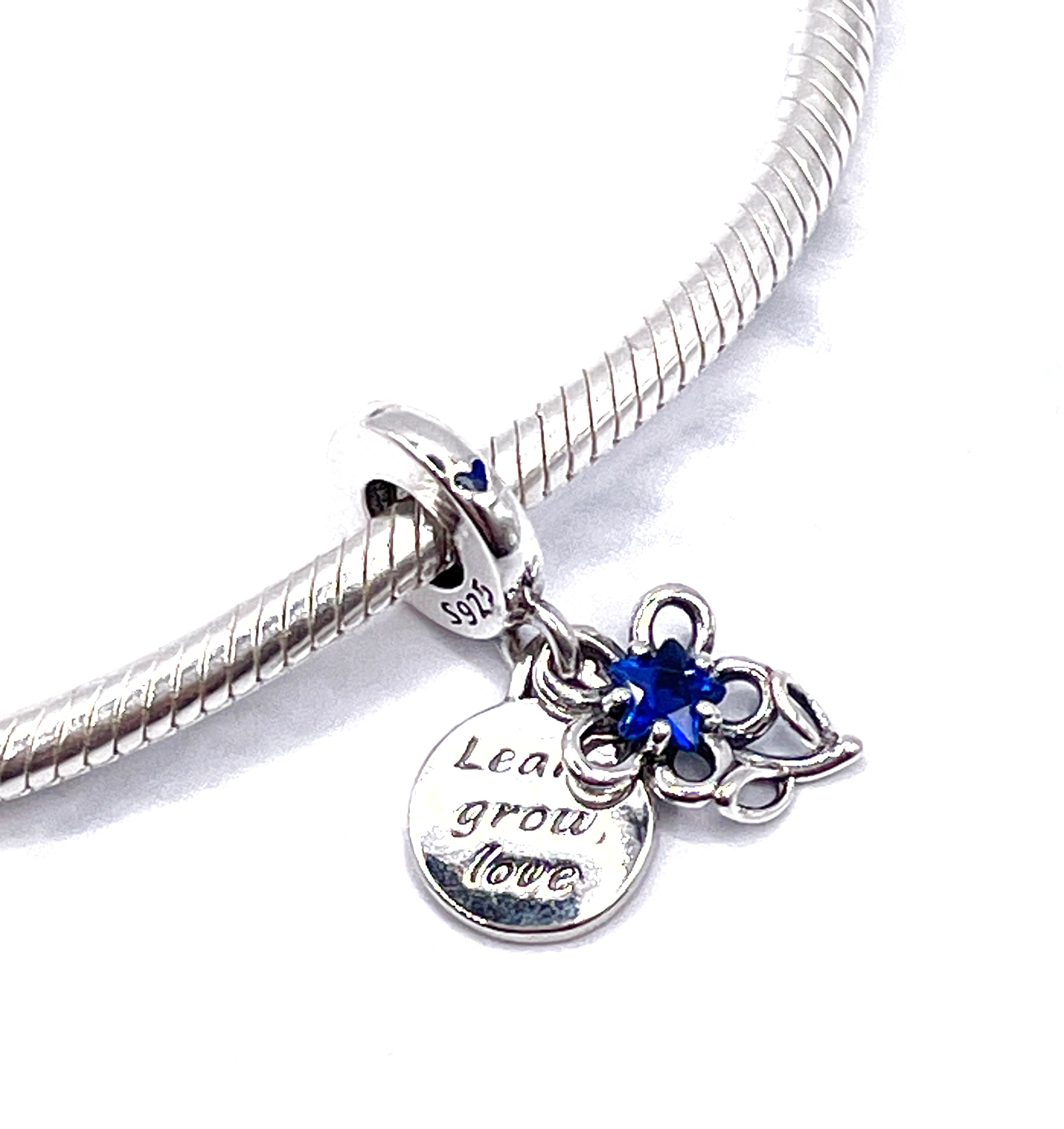 Flor azul “Aprender, crecer, amar”